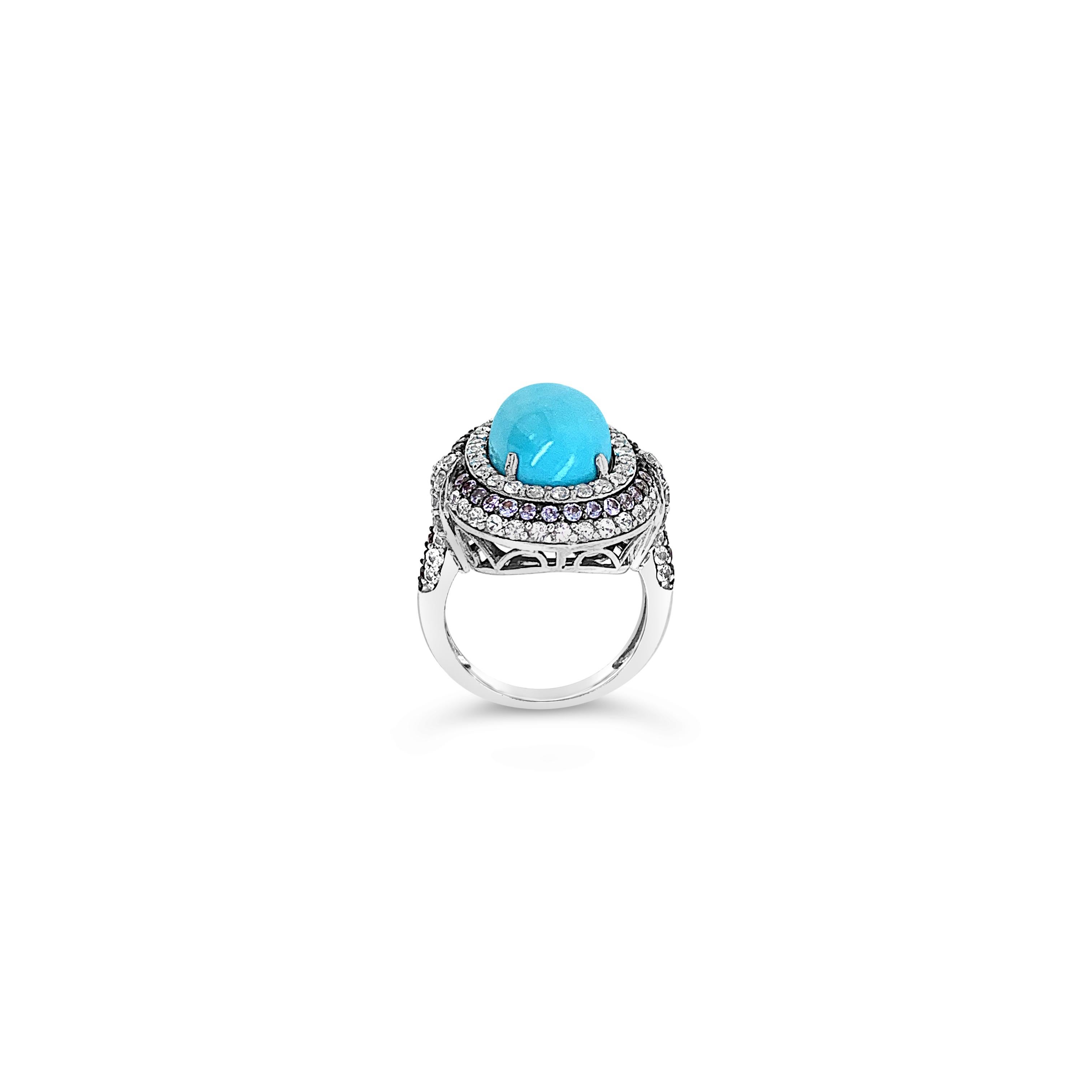 Carlo Viani® Ring featuring 6 3/8 cts. Robins Egg Blue Turquoise™, 1 1/4 cts. White Sapphire, 5/8 cts. Blueberry Tanzanite®,  set in 14K Vanilla Gold®

Diamonds Breakdown:
None

Gems Breakdown:
6 3/8 cts Turquoise
1 1/4 cts White Sapphire
5/8 cts