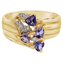Carlo Viani Ring mit Tansanit, Vanilla-Diamanten in 14 Karat Honiggold gefasst