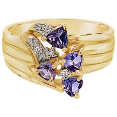 Carlo Viani Ring with Tanzanite, Vanilla Diamonds Set in 14 Karat Honey Gold