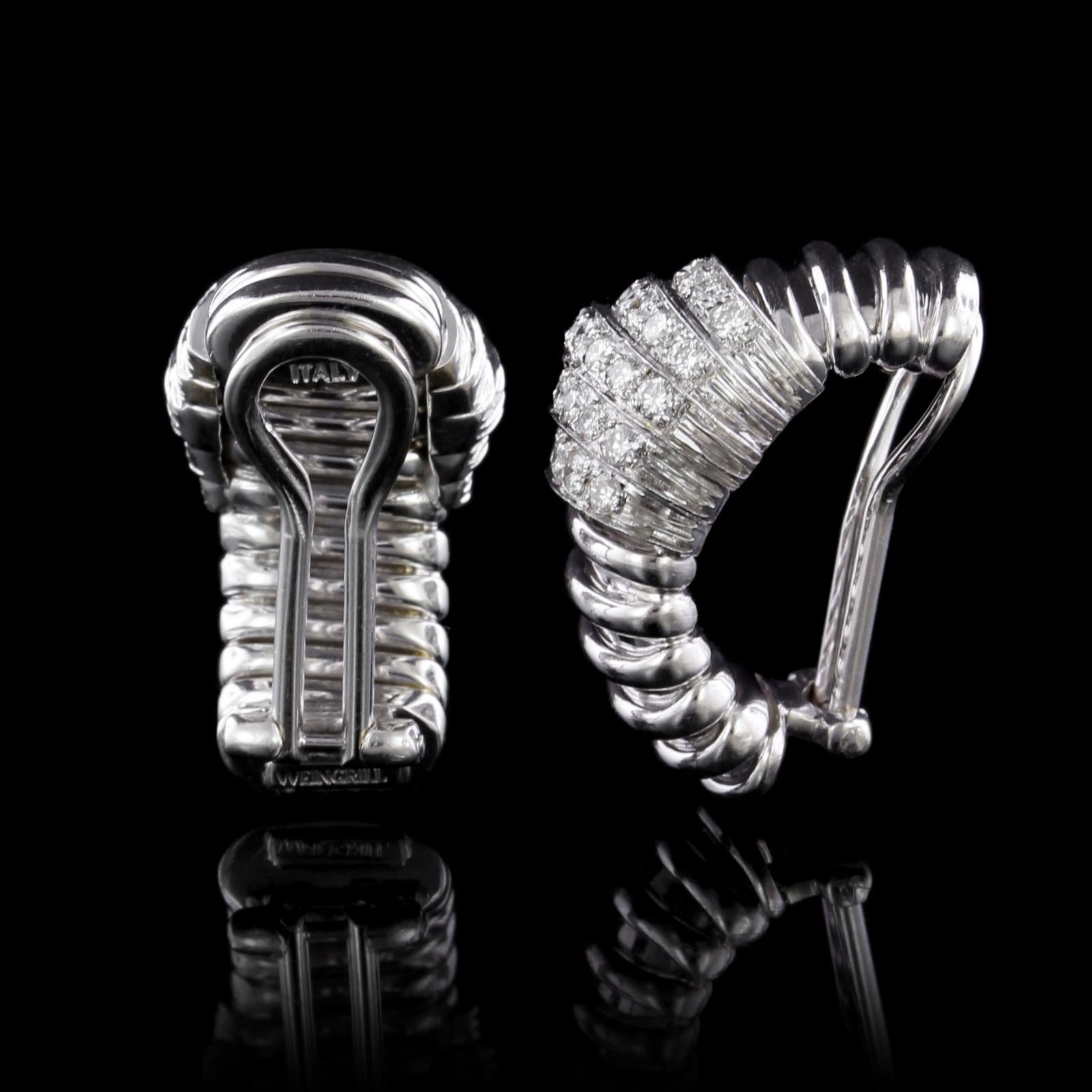 Carlo Weingrill 18K White Gold Diamond Tubogas Earrings. The earrings are set
with 58 full cut diamonds, approx. total wt. .90cts., G color, VS clarity, width 9.00mm.,
length 7/8