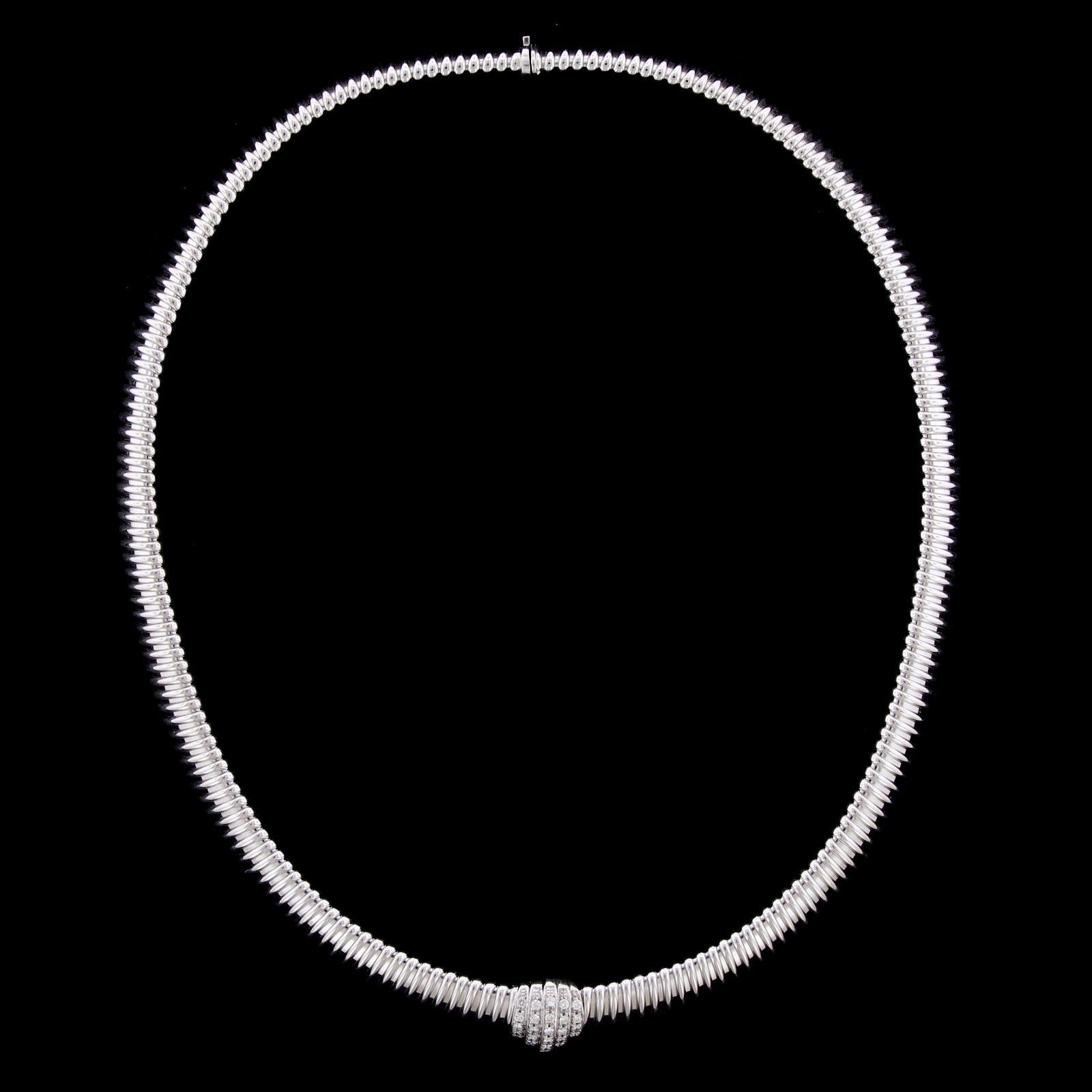 Carlo Weingrill 18K White Gold Diamond Tubogas Necklace. The necklace is set
with 29 full cut diamonds, approx. total wt. .45cts., G color, VS clarity, completed by an
18