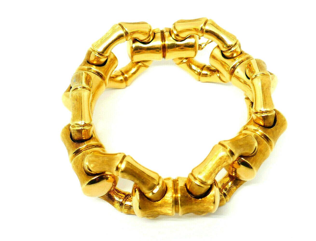 Oversized bamboo link makes this bracelet look outstanding. 
It's a chunky bold piece you will be wearing every day as it's a reversible item that can be worn both sides. For a casual wearing put it on with a brushed gold surface up. Reverse it to a