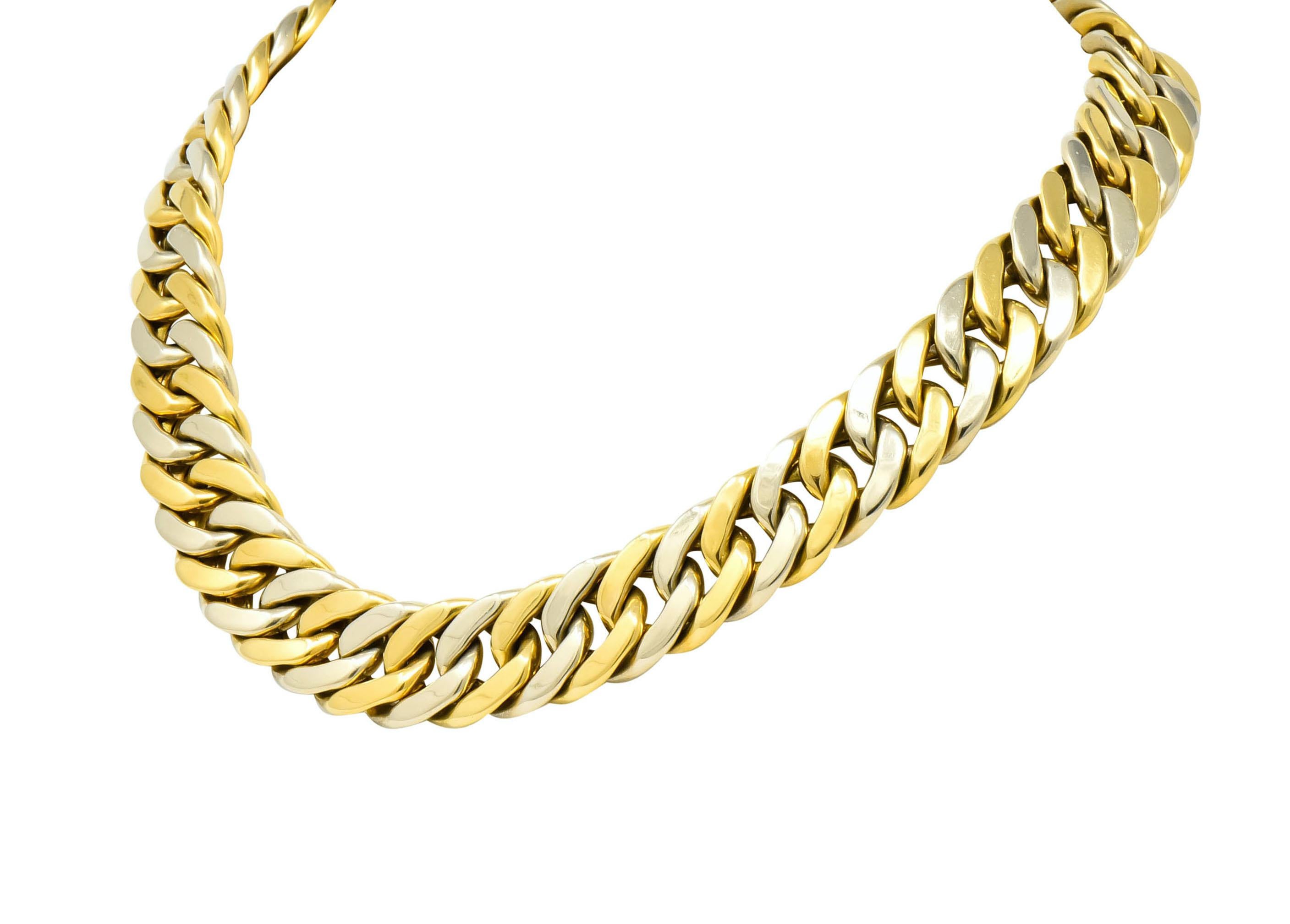 Necklace comprised of hollow, curbed links of alternating white and yellow gold

With a high polished finish

Completed by concealed hinged clasp

Signed Weingrill with assay marks for Verona Italy and maker's mark for Carlo Weingrill

Stamped 750