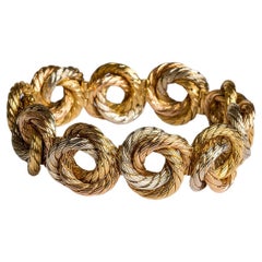 Carlo Weingrill: "love knot" circular three tone gold bracelet