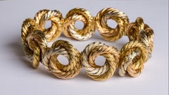 Retro Carlo Weingrill: "love knot" circular three tone gold bracelet