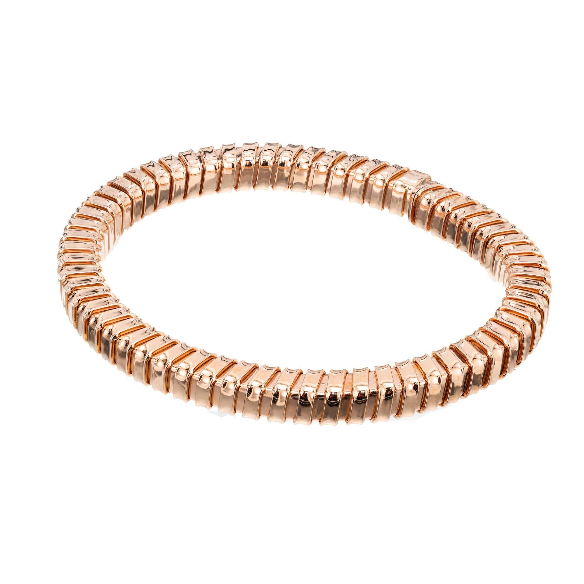 Carlo Weingrill Tubogas cuff bracelet. Crafted in high polished 18k rose gold in a segmented tube design. Semi flexible cuff style. 7 inch. Weingrill hallmark

18k rose gold
Stamped: 750
Hallmark: Weingrill
21.4 grams
Width: