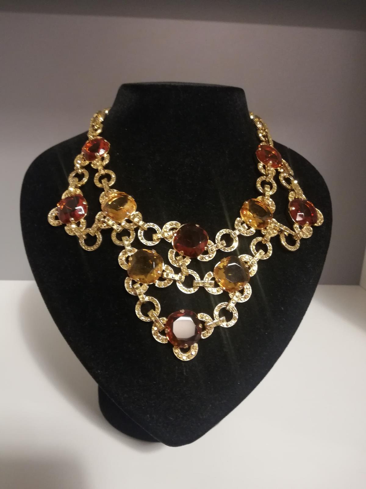 Fantastic piece by Carlo Zini
One of the world greatest bijoux designers
Non allergenic brass
18 KT Gold dipped 3 micron
Amazing hand creation of amber and topaze like crystals
100% Artisanal work
Made in Milano
Worldwide express shipping included