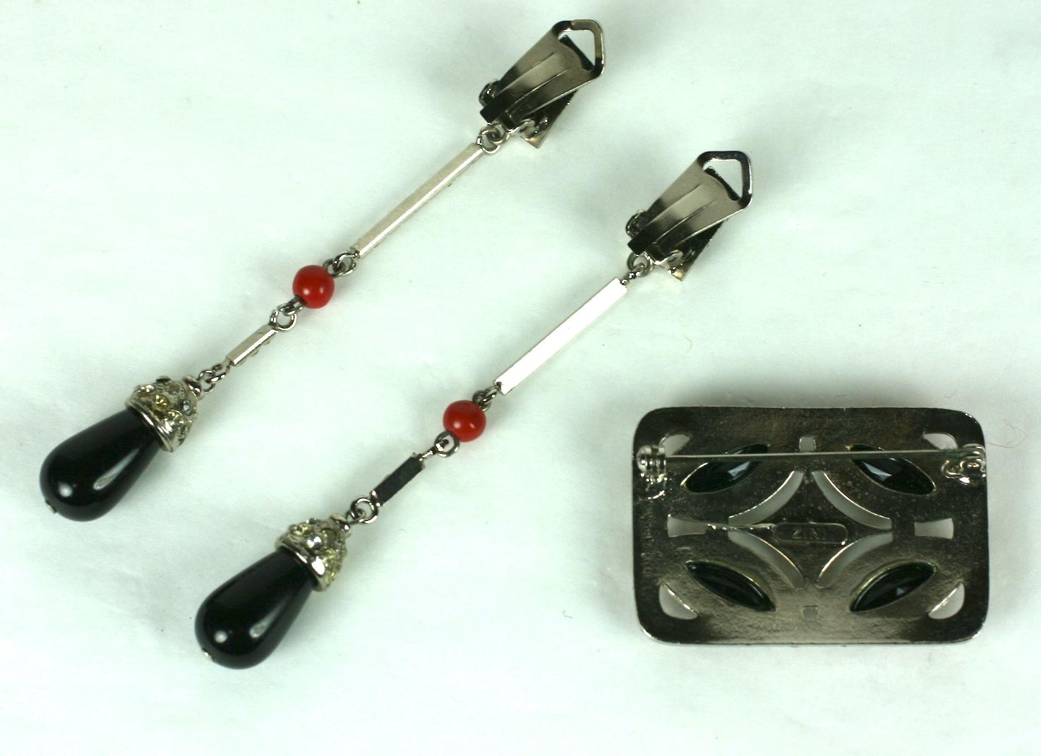 Carlo Zini's Art Deco Style Italian Earring-Pin Suite composed of long earrings and brooch. Earrings and brooch in the Art Deco style with faux coral, onyx and pastes. Clip back fittings on earrings.  1990's Italy.  
Brooch 1.75