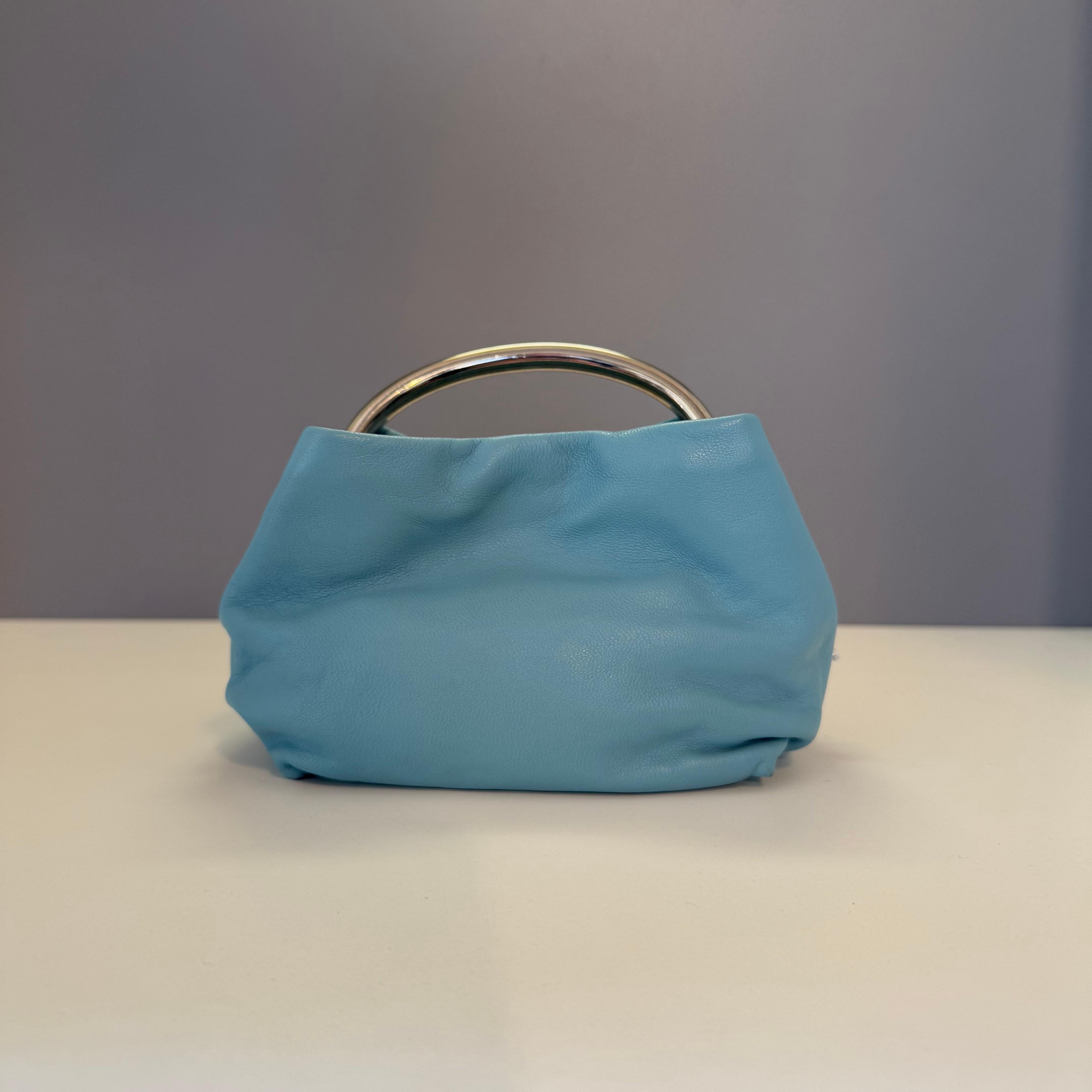Vintage mini pochette by Carlo Zini
Leather
Turquoise color
Metal handle
Coolored butterfly with strass
Authomatic button closure
Cm 15 x 10 x 8 (5,9 x 3,93 x 3,14 inches)
Free Express shipping via Fedex or DHL