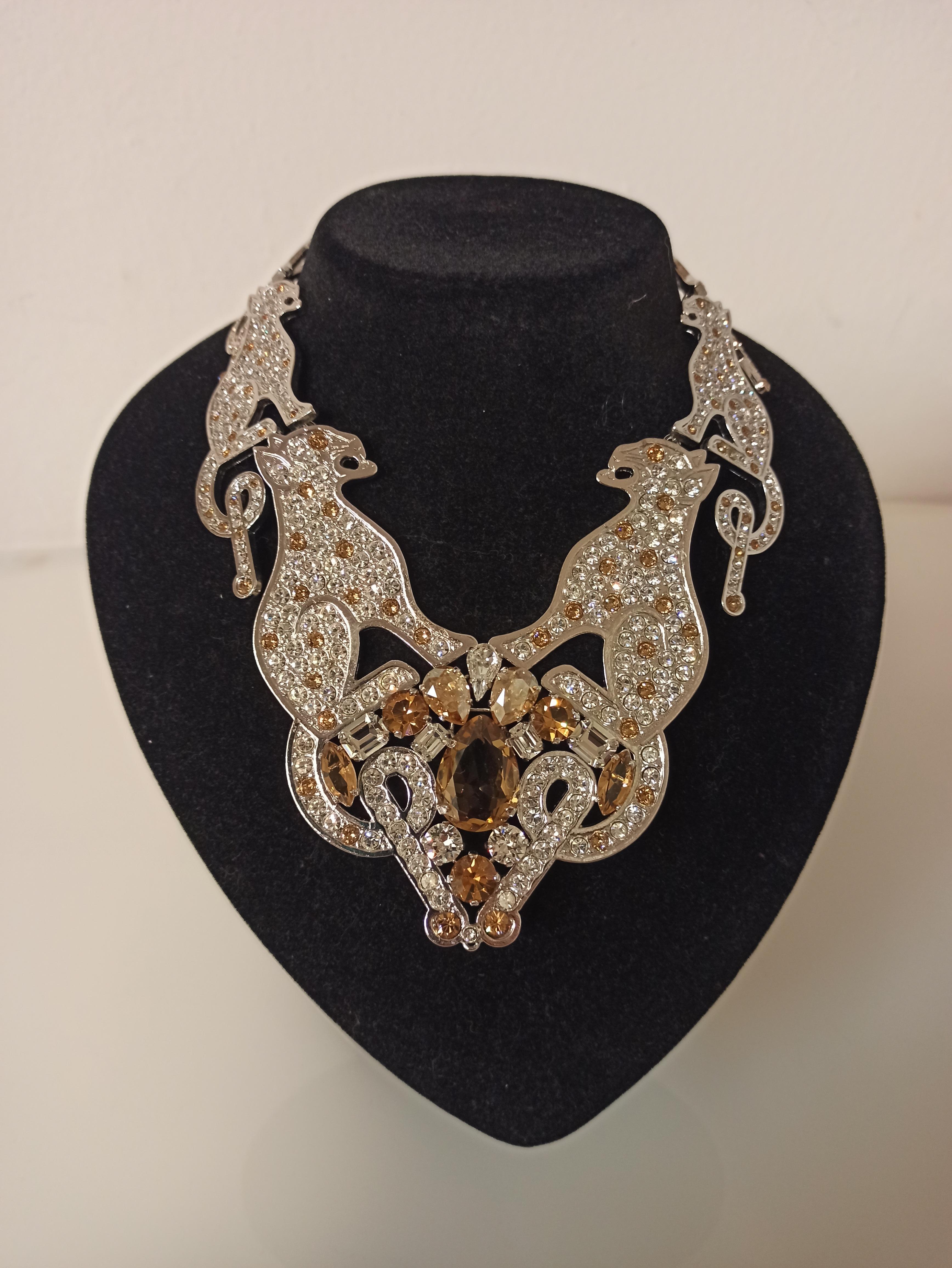 Fantastic piece by Carlo Zini
One of the world greatest bijoux designers
Non allergenic rhodium
Amazing hand application of swarovski crystals
Champagne/amber cut crystals
100% Artisanal work
Made in Milano
Worldwide express shipping included in the