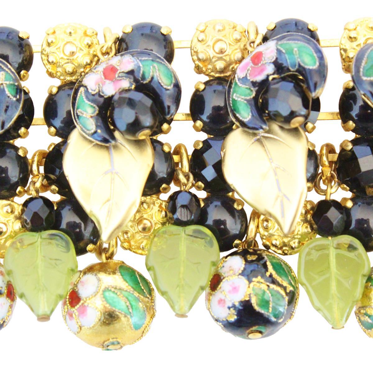 Fantastic masterpiece by Carlo Zini
One of the world greatest bijoux designers
Non allergenic rhodium
18 KT Gold dipped
Amazing hand creation of crystals, rhinestones and resins
Hand painted floral elements 
Golden leaves
100% Artisanal work
Made in