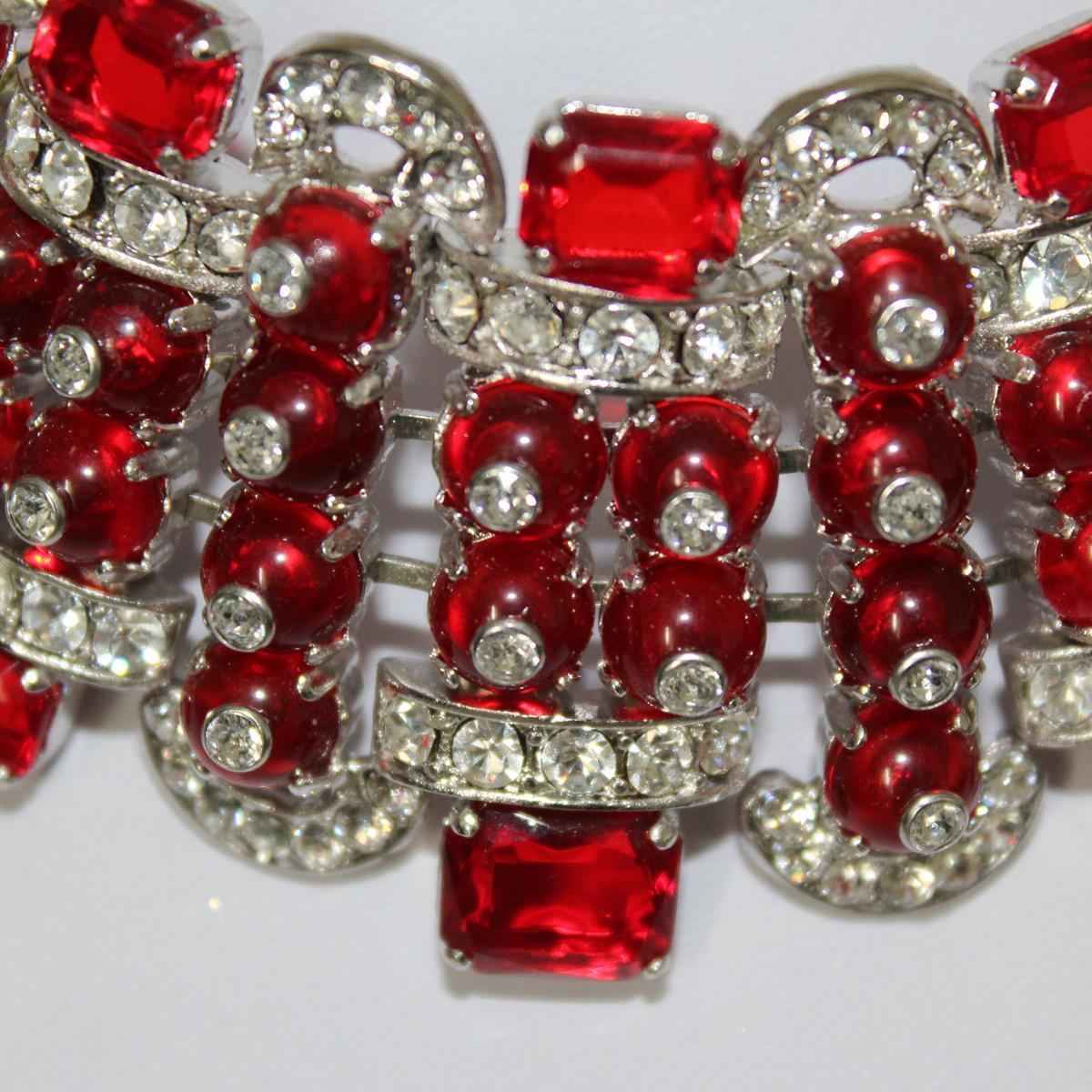 Fantastic masterpiece by Carlo Zini
One of the world greatest bijoux designers
Perfect for San Valentino !
Non allergenic rhodium
Amazing hand creation of Swarovski crystals
Ruby like stones and resins 
100% Artisanal work
Made in Milano
Worldwide
