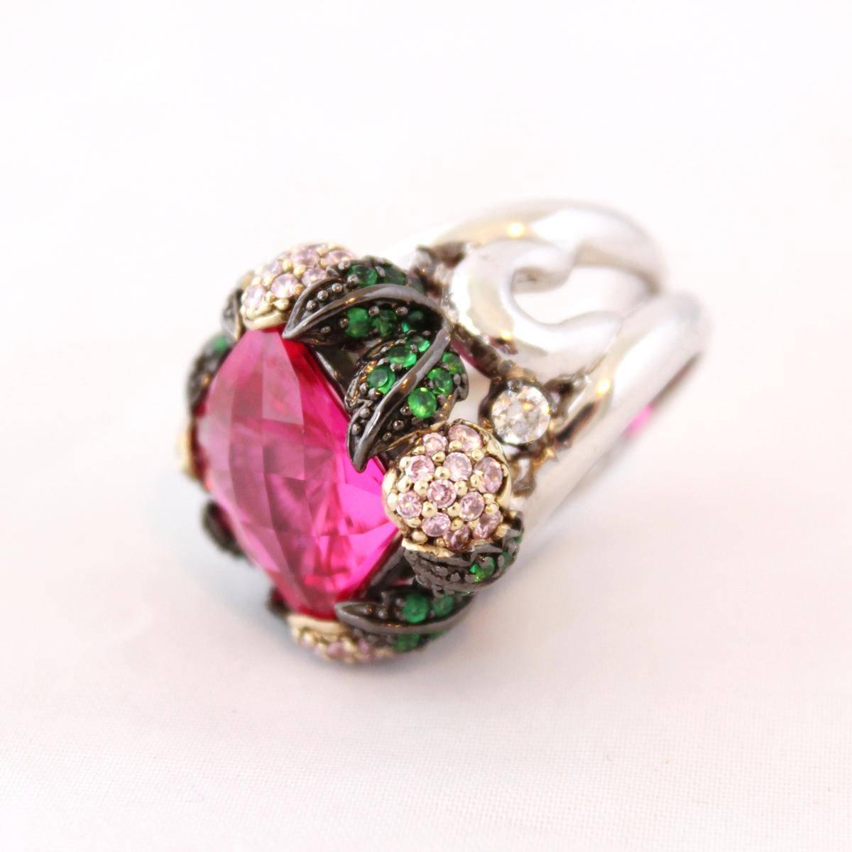 Stunning piece by Carlo Zini Milano
One of the greatest world fashion jewelry designers
Vintage, Dior style
Silver
Green and rose swarovski crystals 
Large central fuchsia glass
Size 60 (19.11 mm)
Unique piece
100% Artisanal work made in