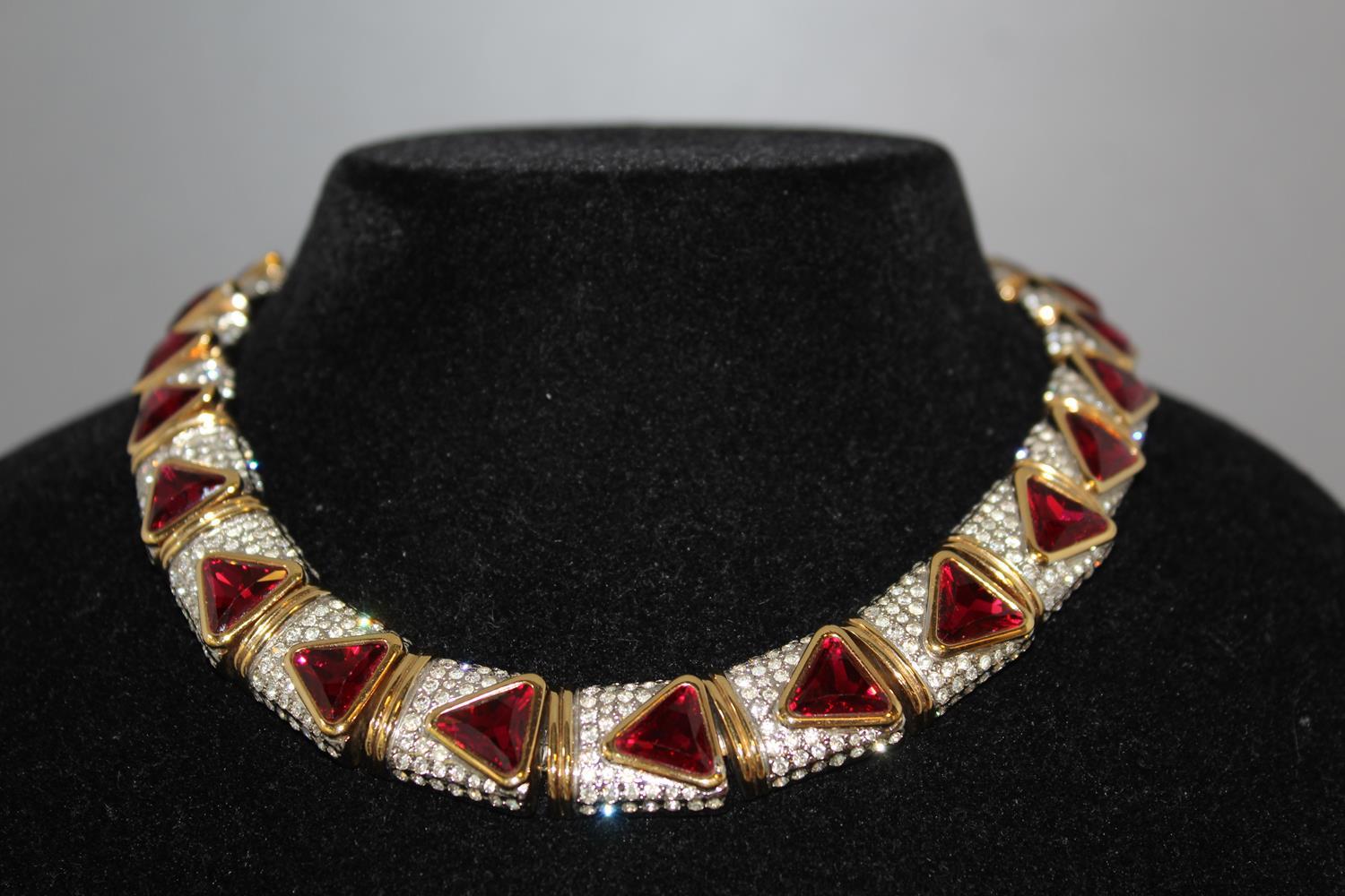 Fantastic vintage masterpiece by Carlo Zini
One of the world greatest bijoux designers
Non allergenic brass
18 KT Gold dipped 3 micron
Amazing hand creation of Ruby like elements and Swarovski crystals 
100% Artisanal work
SO beautiful that seems