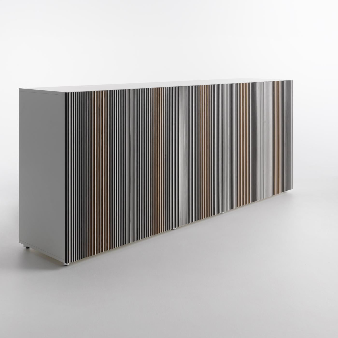Inspired by the work of Venezuelan artist Carlos Cruz-Diez and his Op Art style, this impeccable five door-sideboard by Renato Zamberlan is an innovative piece of functional decor. Crafted of thermo-treated oak with a mocha finish and white HPL