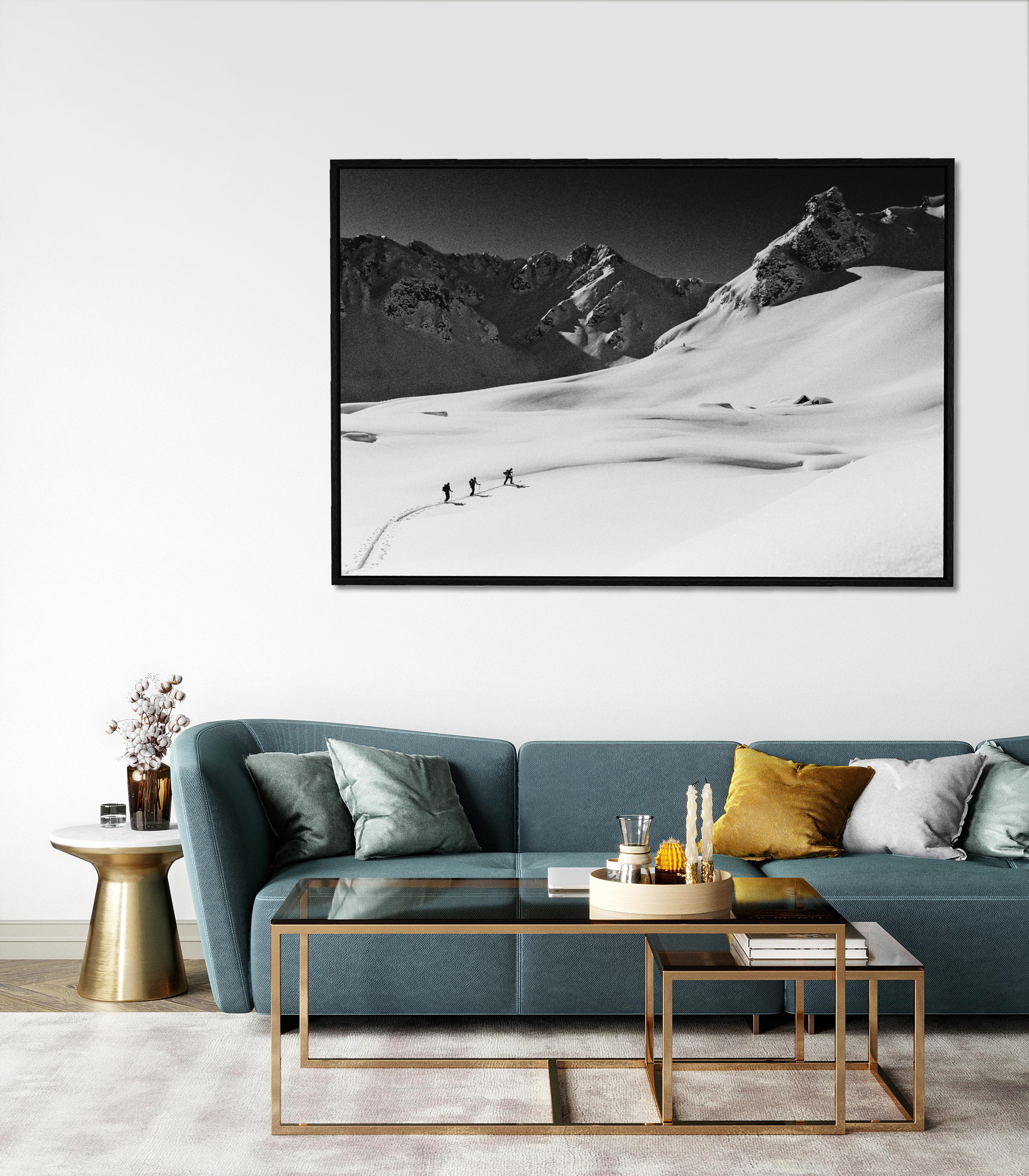 Enroute - Large Mountain Skiing Black & White Art Photography - Gray Black and White Photograph by Carlos Blanchard