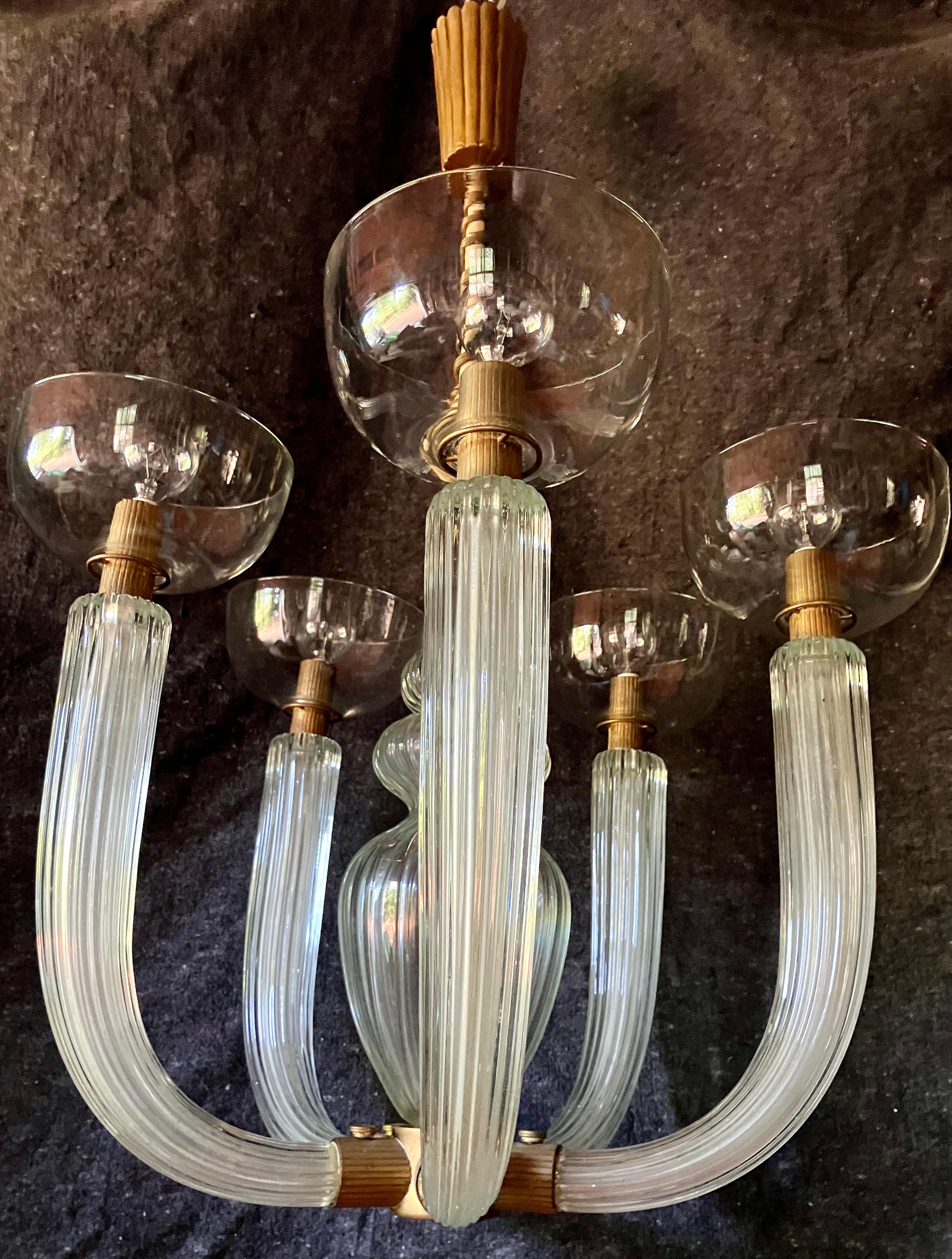Carlos Scarpa five armed chandelier. Five arm Venetian moderne unmistakably Scarpa design pendant in reeded glass with central baluster issuing coiled brass on white painted metal stem spiraling up to gold painted and reeded metal  canopy. Carlo