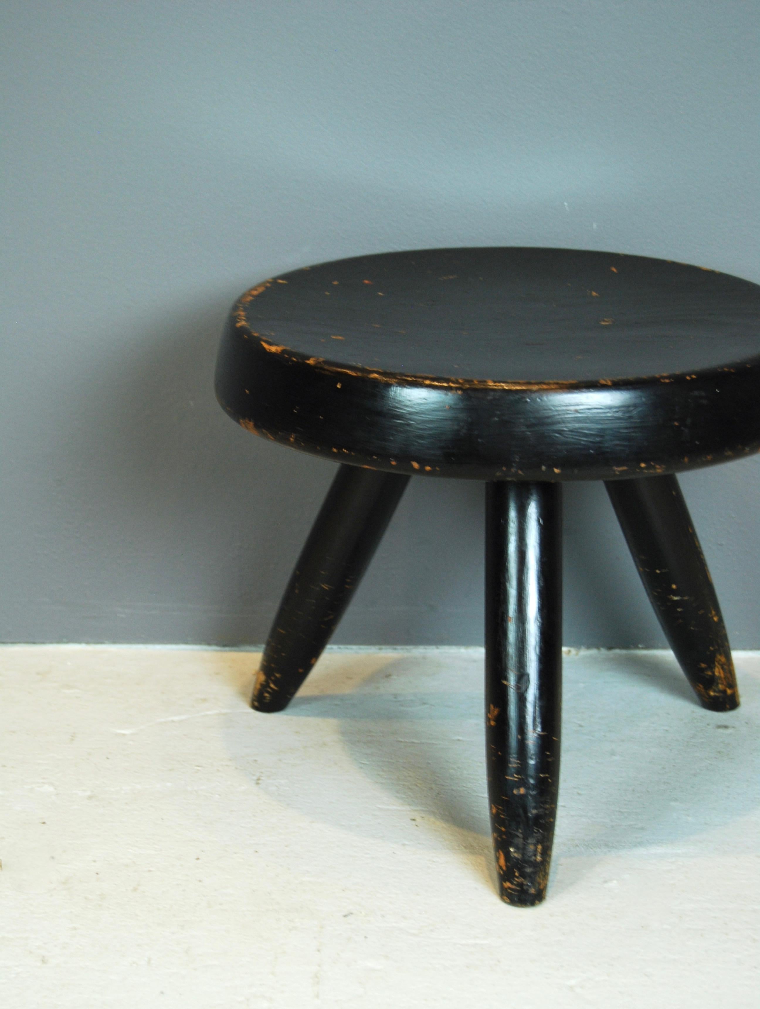 Solid elm, low stool by Charlotte Perriand, stained black, designed in 1953 and distributed by Steph Simon Gallery in Paris.
Stool is in original condition with signs of ware and age.