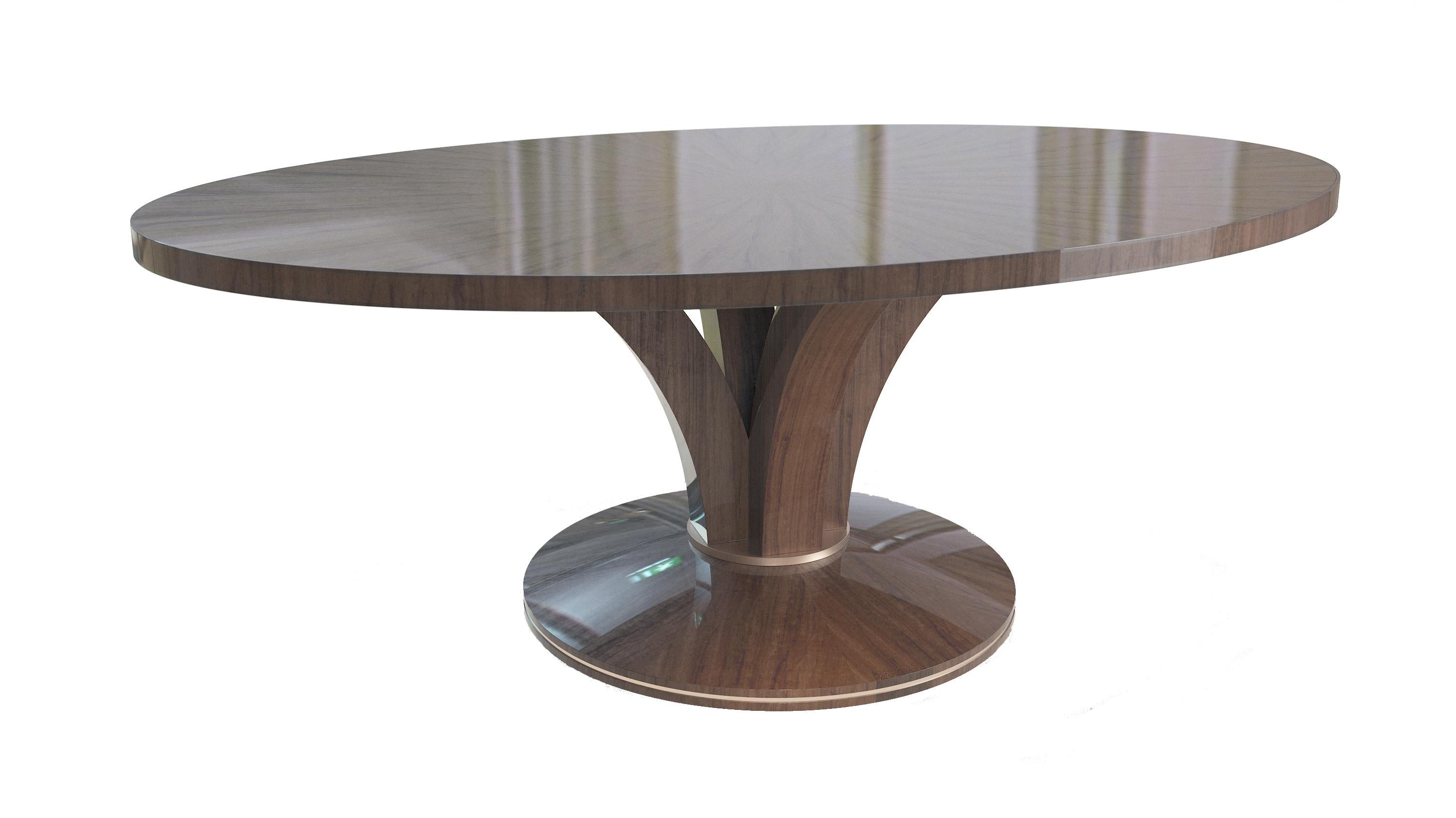 A favourite from our dining table collection finished in sycamore slate grey with a gleaming polished nickel collar.

This elegant dining table oozes understated luxury and looks fabulous in any smart dining room with its chic curves and high gloss