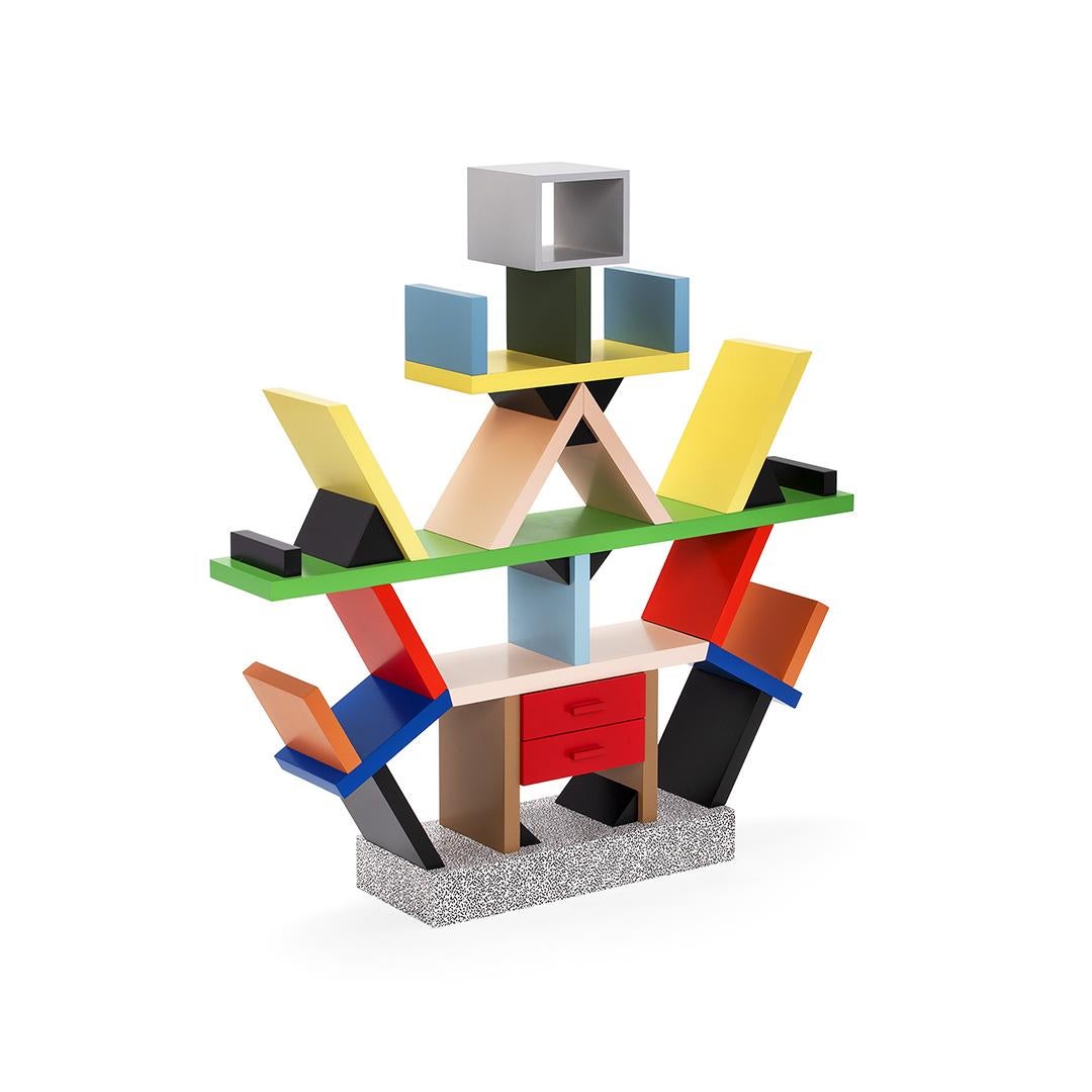 Here you are shown an authentic and perfect reproduction of the Carlton bookcase, originally designed in 1981 by Ettore Sottsass. The vivid colors and seemingly random interplay of solids and voids, suggest Avant Garde painting and sculpture. This