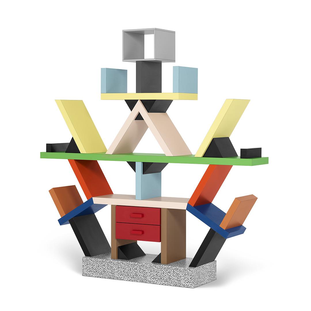 Here you are shown an authentic and perfect reproduction of the Carlton bookcase and room divider, originally designed in 1981 by Ettore Sottsass. The vivid colors and seemingly random interplay of solids and voids, suggest Avant Garde painting and