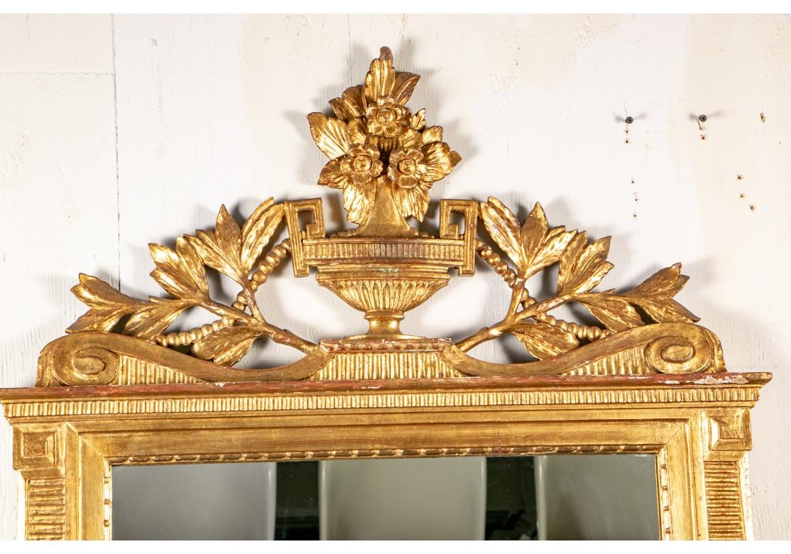 Regency Carlyle Hotel Carved And Gilt Mirror With Floral Urn Crest For Sale
