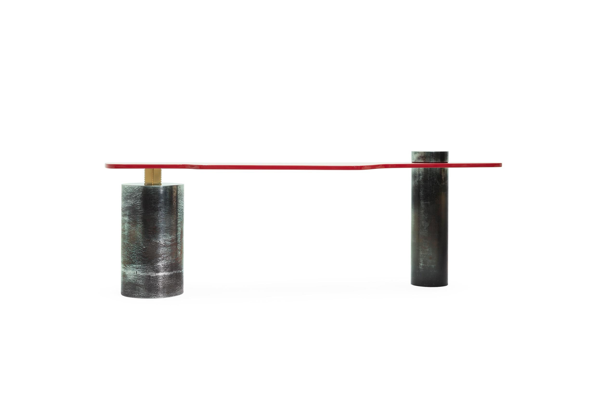 CARM CONSOLE - 21st century contemporary Carmine red lacquer patinated steel legs console table.

Is it carm or karm? Probably both. The karmic alliance of its shape, materials and vivid carmine colour transform conventional concept of a console