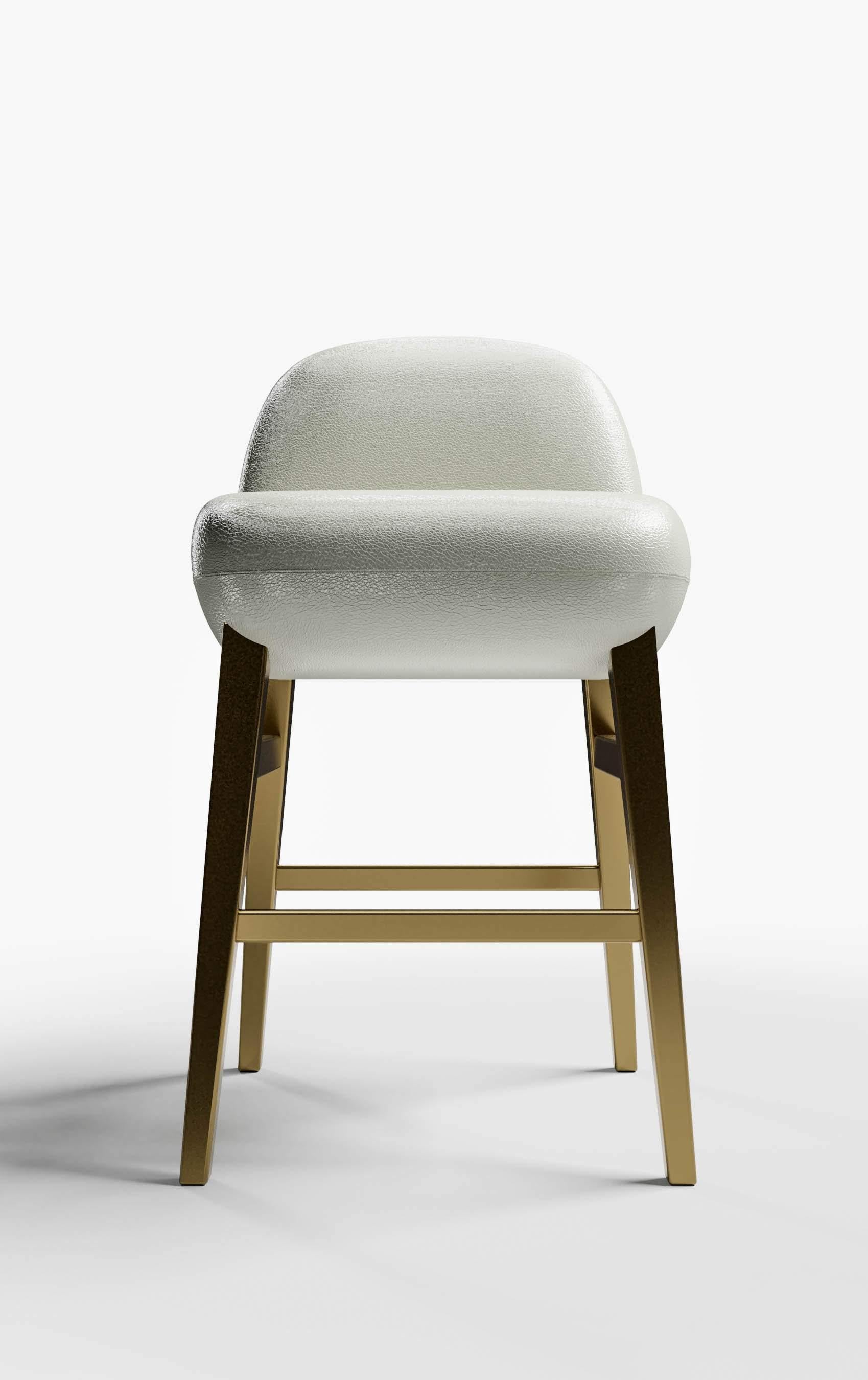 The Carmel barstool is like sitting on a cloud. Its inviting posture and dynamic metallic base will be sure to create a stir from your guests. The Carmel barstool can be upholstered in a variety of leathers and fabrics and is shown in Lealpell