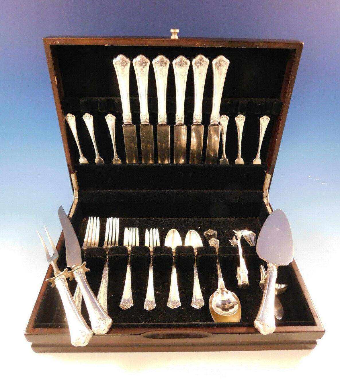 Carmel by Wallace sterling silver Dinner size Flatware set - 38 pieces. Great starter set! This Arts & Crafts pattern was introduced in the year 1912 and features a raised hammered border with stylized bolts. This set includes:

6 Dinner Size