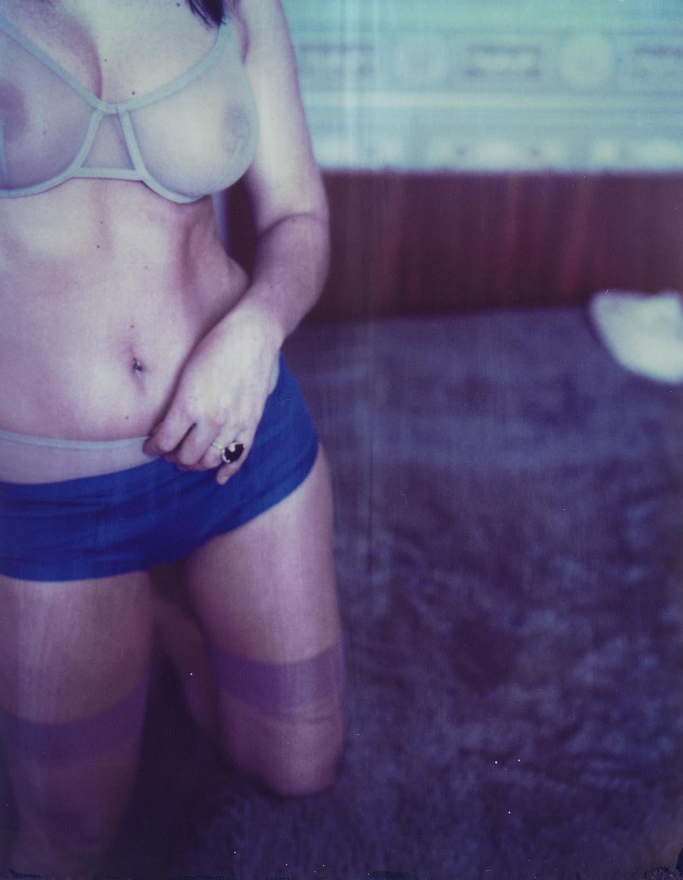 Carmen de Vos Color Photograph - Girl Manoeuvres - 01 - from the series Dunderwear