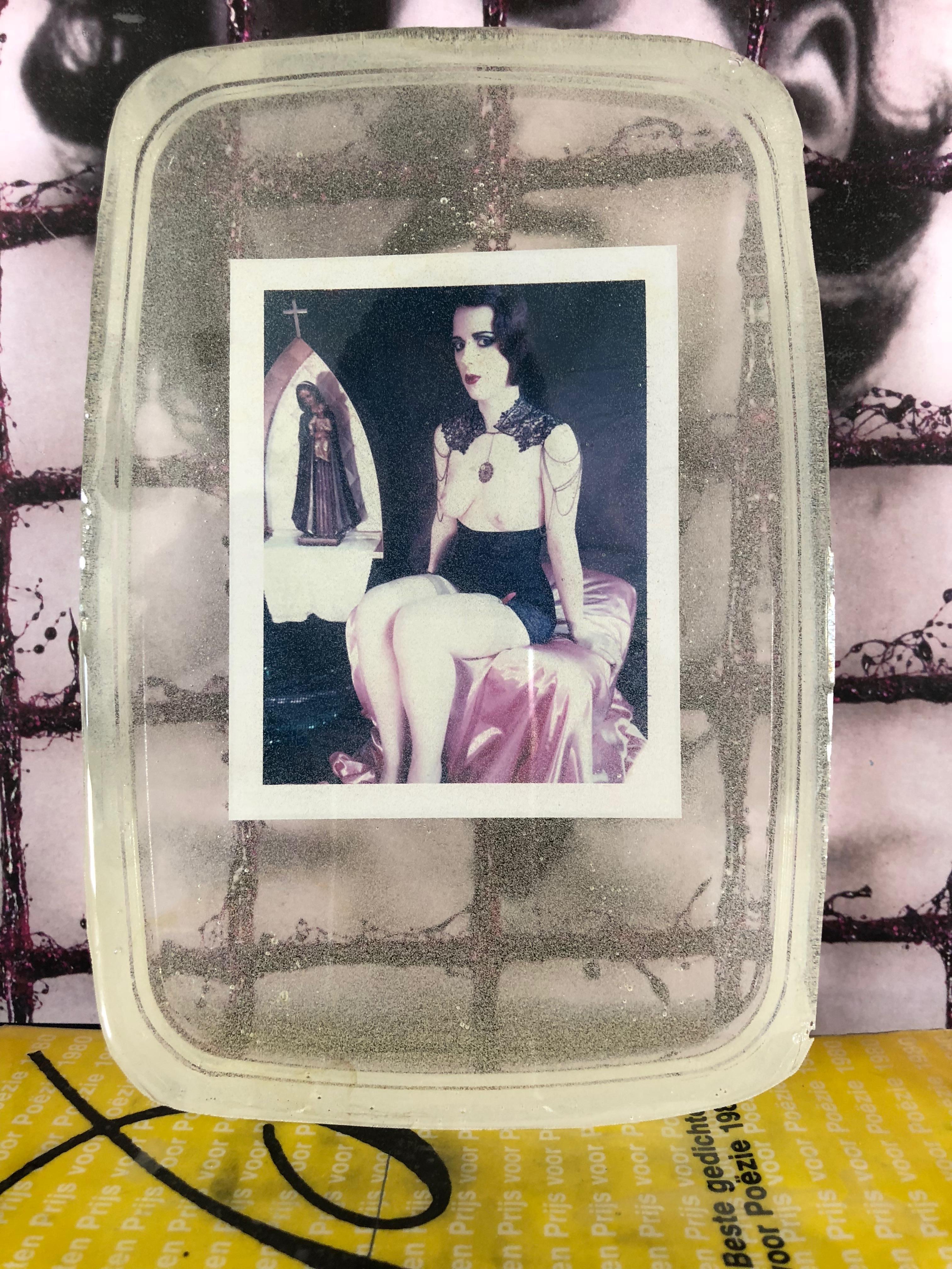 Lourdes #HS01, 2014, 13 x 20 x 2 cm
[Scene from the series Odd Stories]
Original Polaroid - PIÈCE UNIQUE 
Hand cast in resin by the artist
Patented Procédé © Carmen De Vos
Hand signed & certificate by the artist 

This piece was exhibited at the