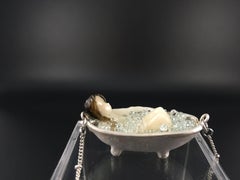BATH- flame-worked glass necklace with female figure in bathtub and silver chain