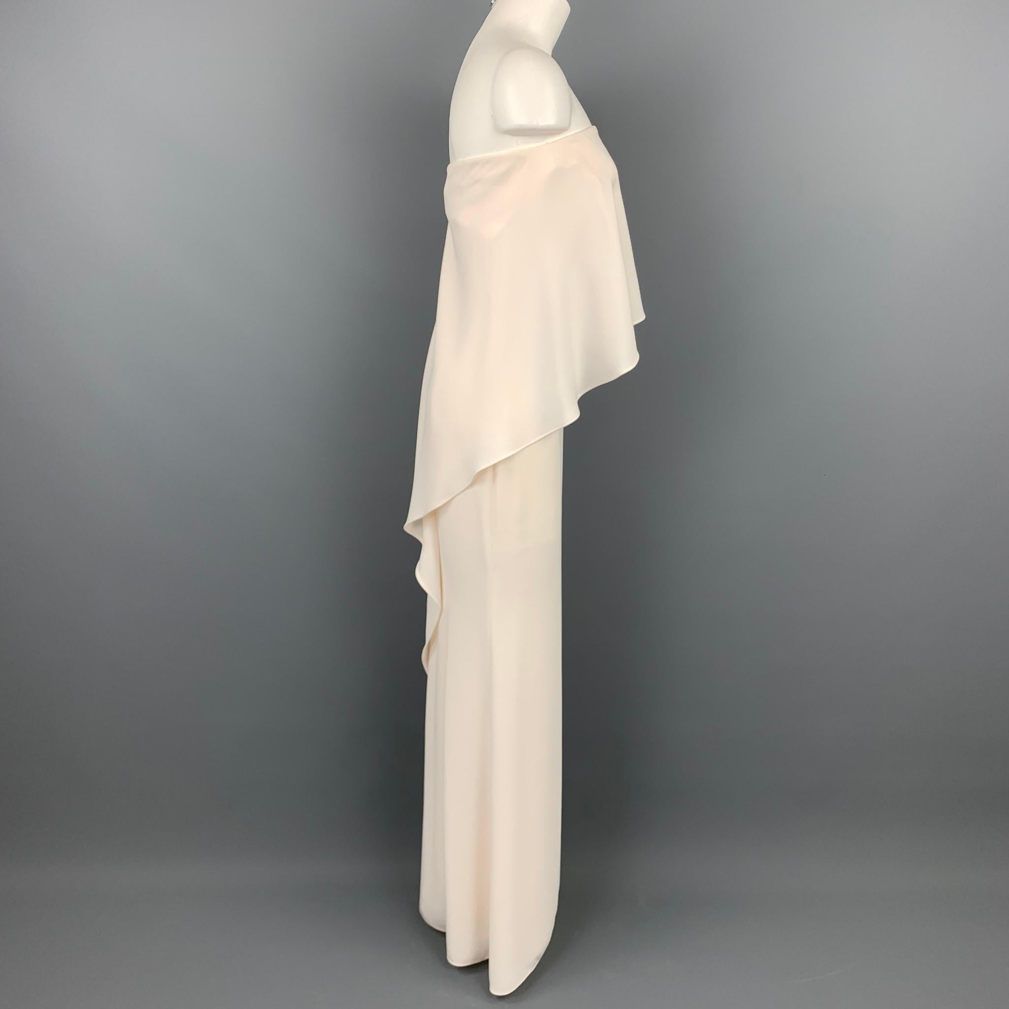 CARMEN MARC VALVO dress comes in a cream polyester with a full slip liner featuring a one shoulder, column, and a side zip up closure. 

Very Good Pre-Owned Condition.
Marked: 2

Measurements:

Bust: 28 in.
Waist: 30 in.
Hip: 36 in.
Length: 52 in. 