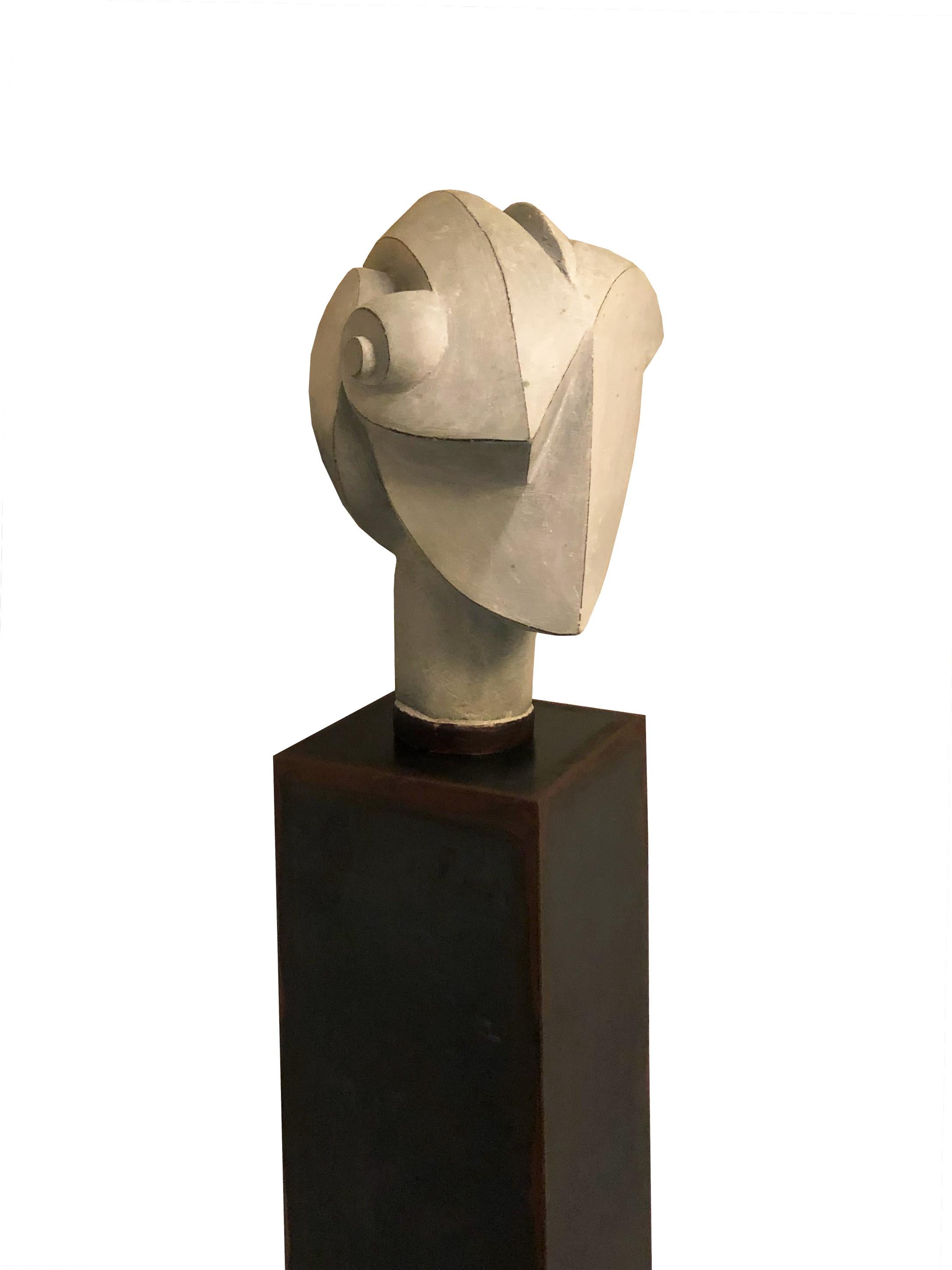 Contemporary cast bronze with white patina sculpture designed by Carmen Otero for her Viento Series. This beautiful pieces represents a futuristic rendering of a helmed head. This piece comes a long with a tall rectangular patinated metal