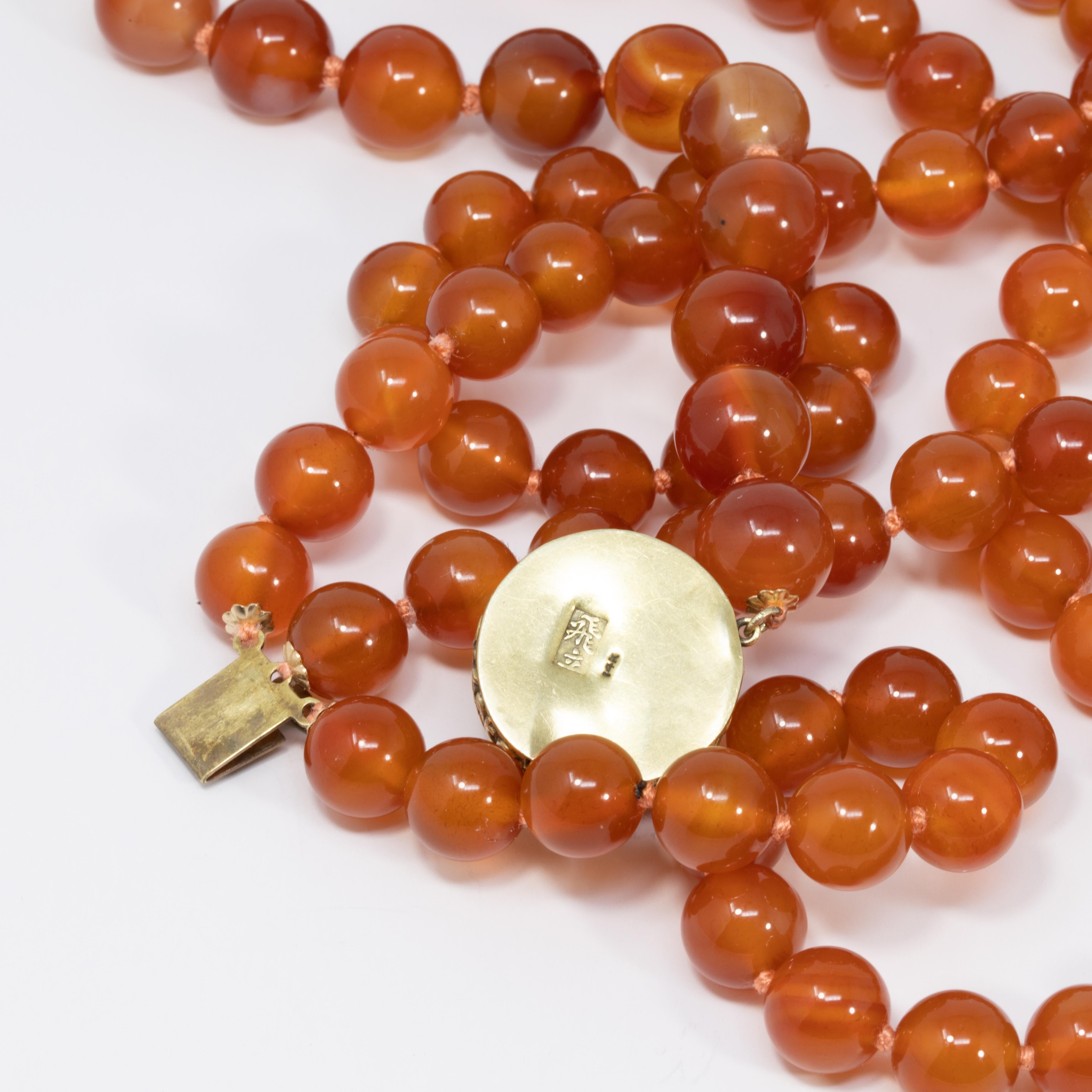 Women's or Men's Carnelian Bead Knotted String Triple Strand Necklace, 14 Karat Clasp For Sale