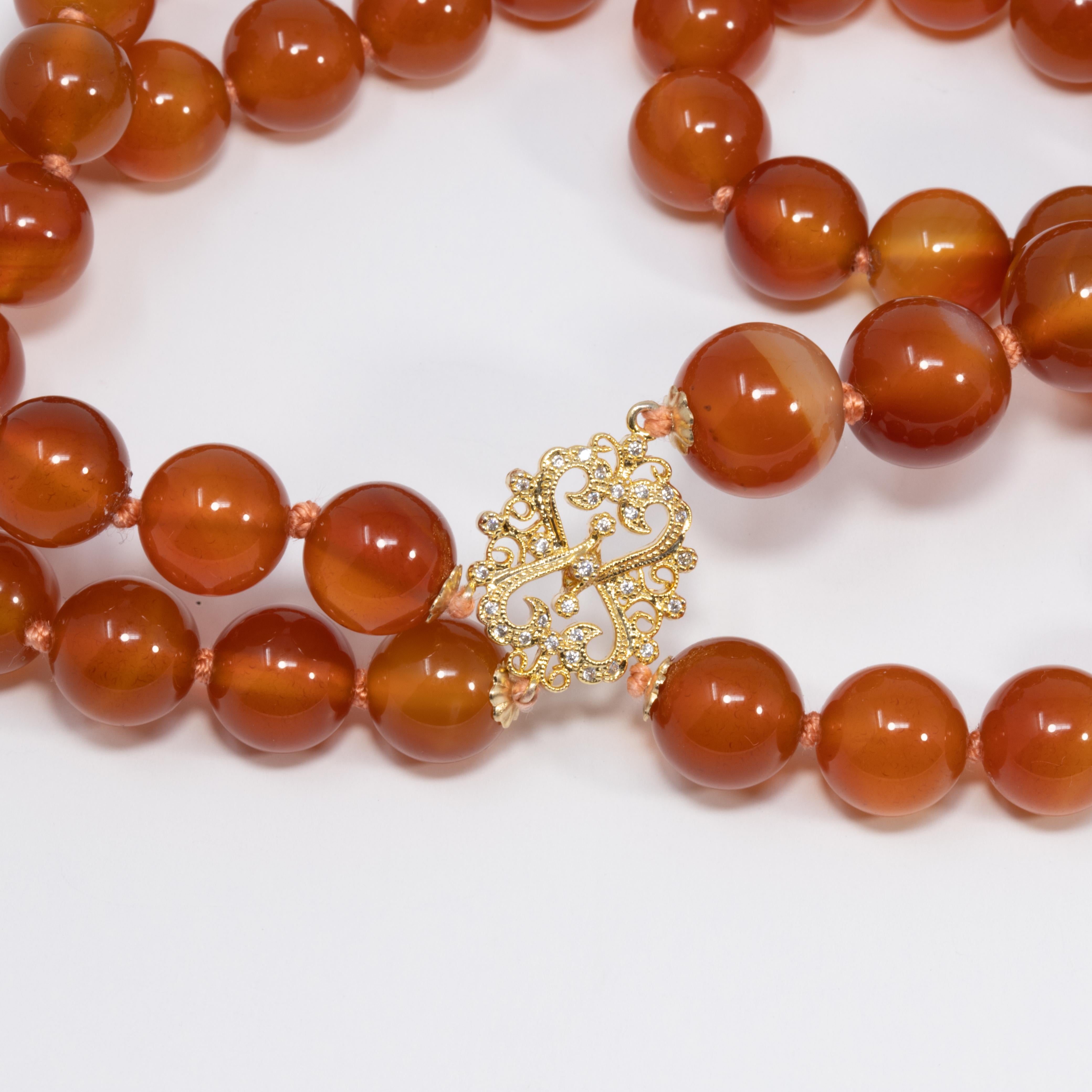 Carnelian Bead Knotted String Triple Strand Necklace, 14 Karat Clasp For Sale 1