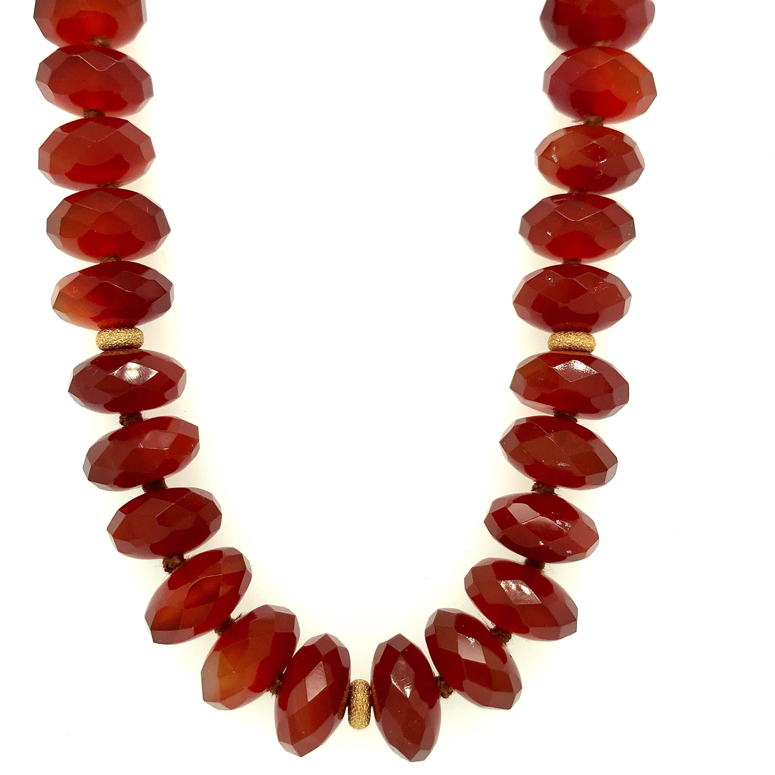 This strand of red carnelian faceted beads is so pretty! Carnelian is the reddish variety of chalcedony quartz, a colorful and versatile gem material so popular in jewelry as beads and cabochons. These beads have rich, even color and have been