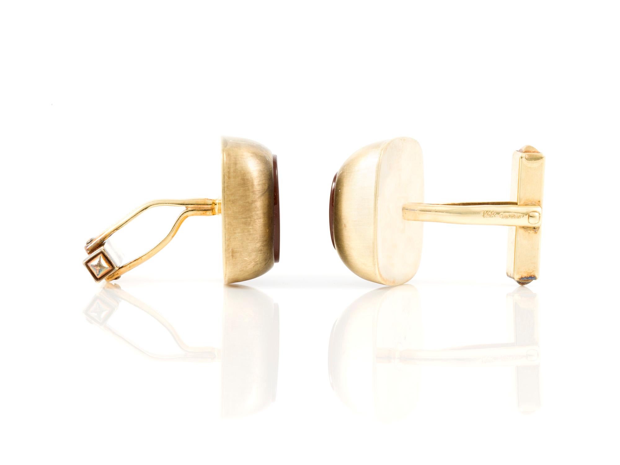 Carnelian cufflinks finely crafted in 14k yellow gold.