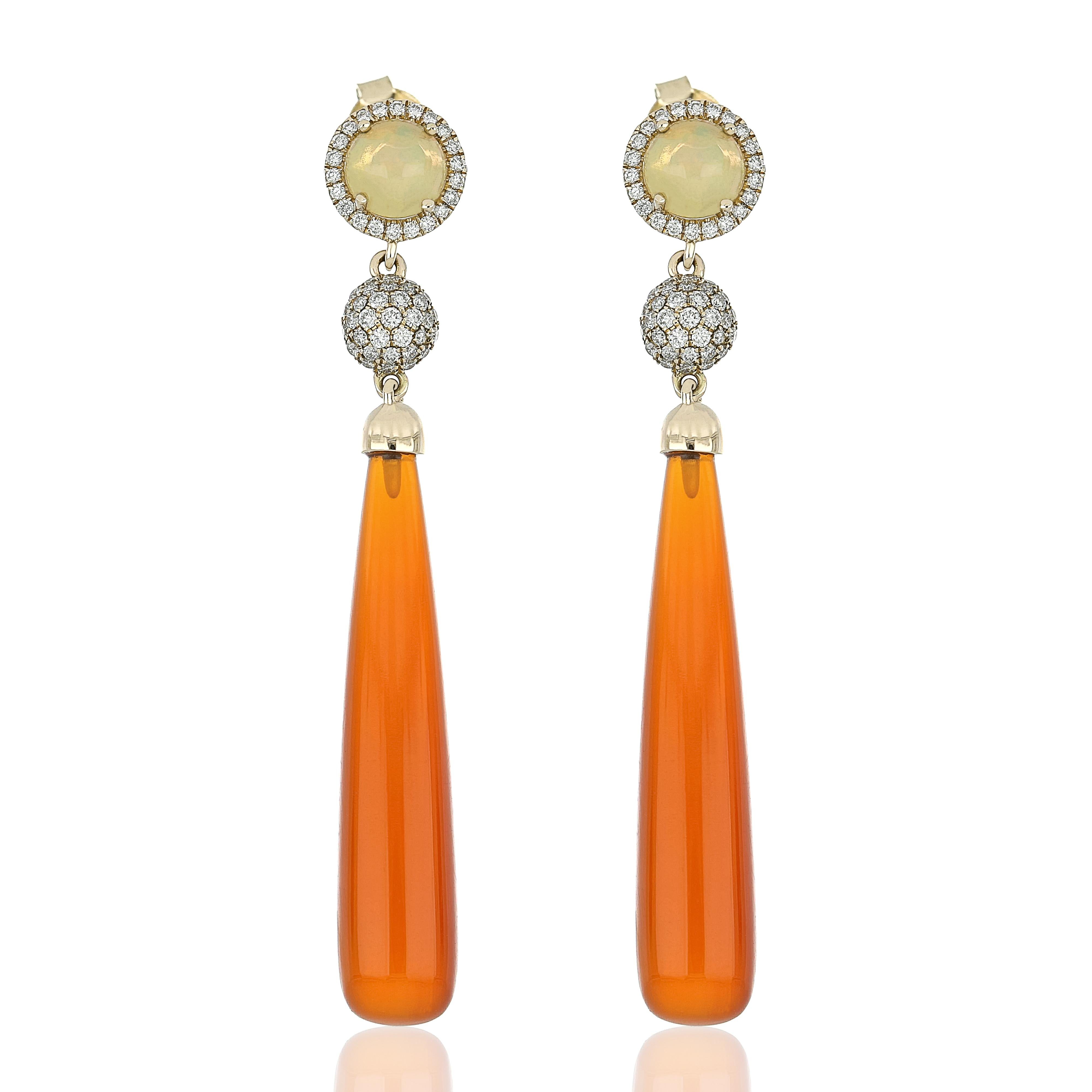 Elegant and exquisitely detailed 14 Karat Yellow Gold Earring, set with 21.58Cts Pear Drop Shape Carnelian, and 0.11 Cts Round Ethiopian Opaland micro pave set Diamonds, weighing approx. 0.465Cts Beautifully Hand crafted in 14 Karat Yellow