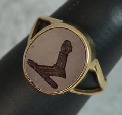 Bague avec sceau en intaille en cornaline et sceau en intaille en or 9 carats