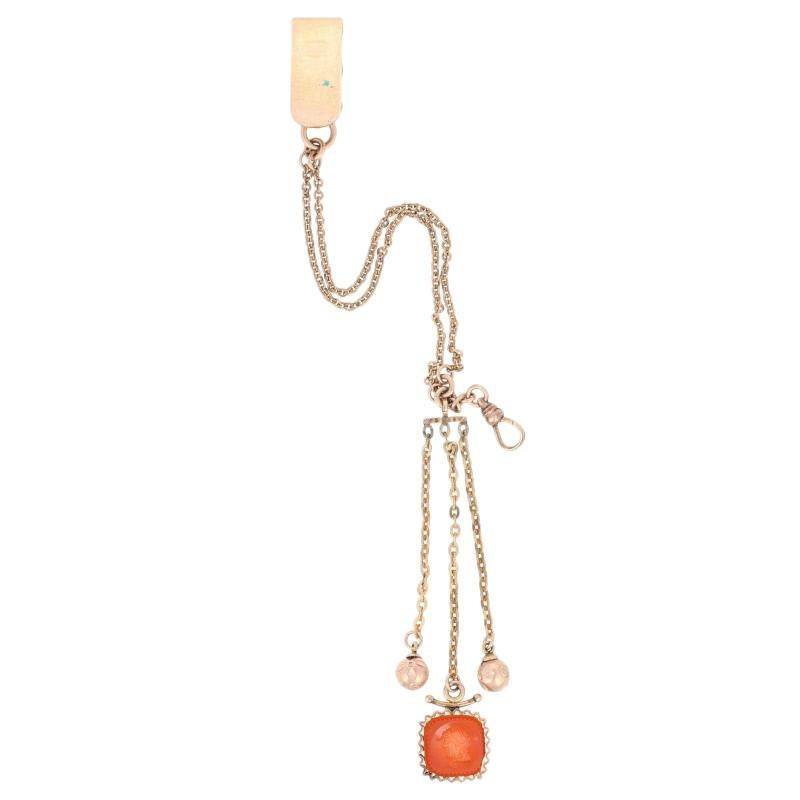 Era: Victorian 

Metal Content: Guaranteed 10k Gold (fob & ball charms) & Gold Filled as tested

Stone Information: 
Genuine Carnelian Intaglio 
Color: Orangey Red  

Measurements: length (clip to base of fob) 9