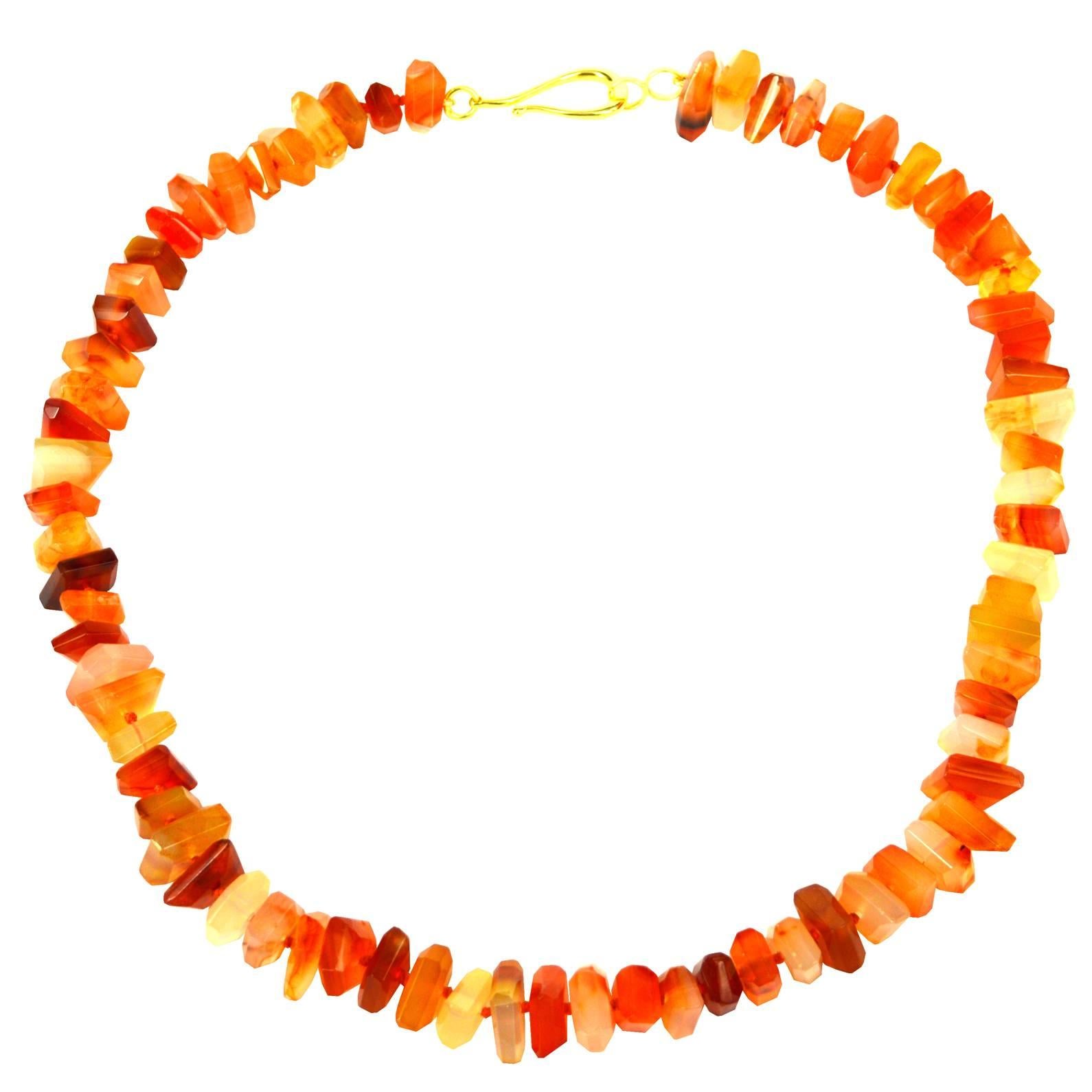 Carnelian Faceted Slice rondel with a 40mm Gold plate Sterling Silver hook Clasp, hand knotted for strength and durability.

Finished necklace measures 55cm.

Custom modification available on request




