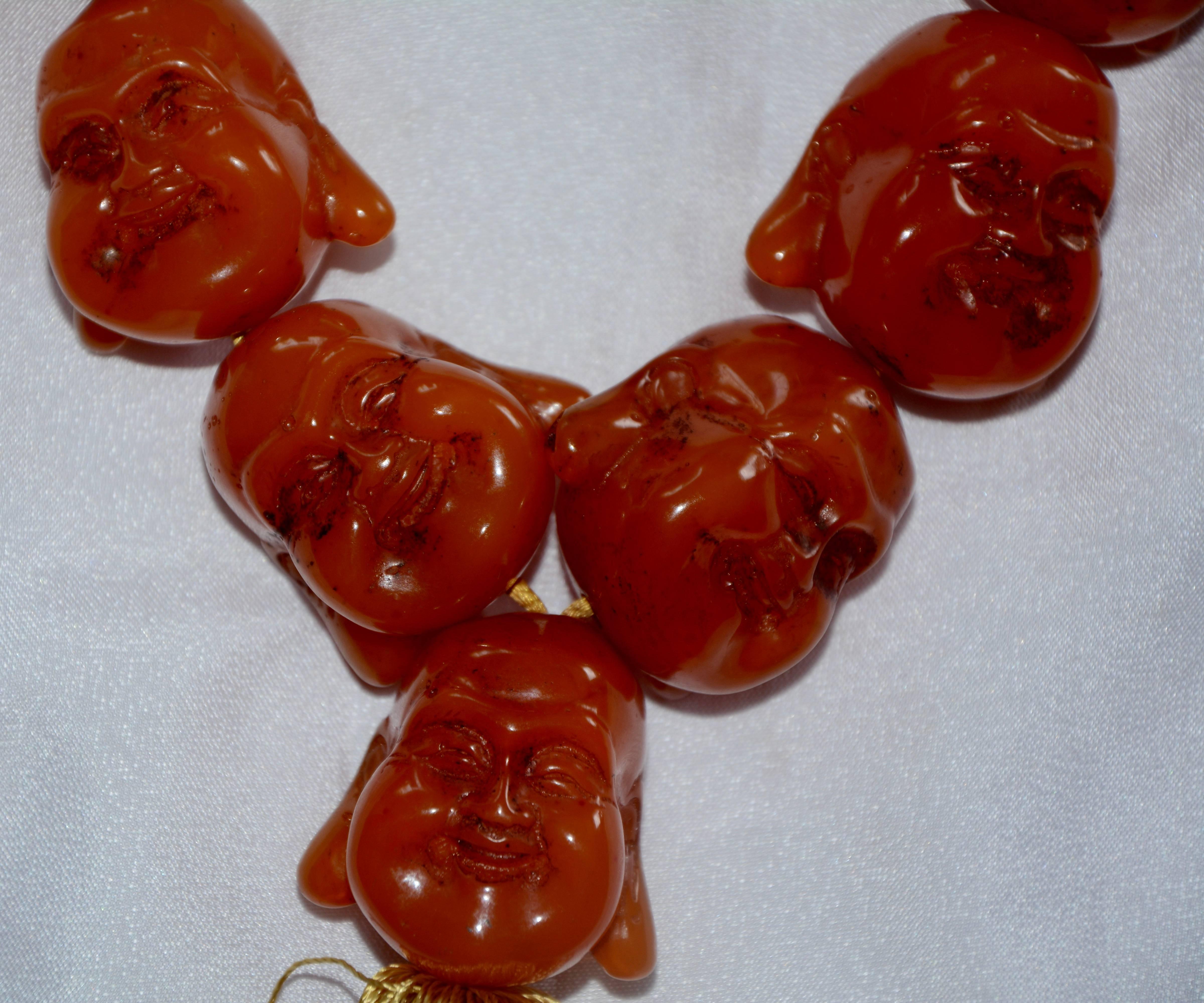 Hand-Carved Carnelian Statement Necklace with Smiling Buddha Heads For Sale