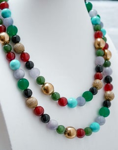 Collana in corniola, turchese, onice, agata, tormalina, oro rosa e argento.