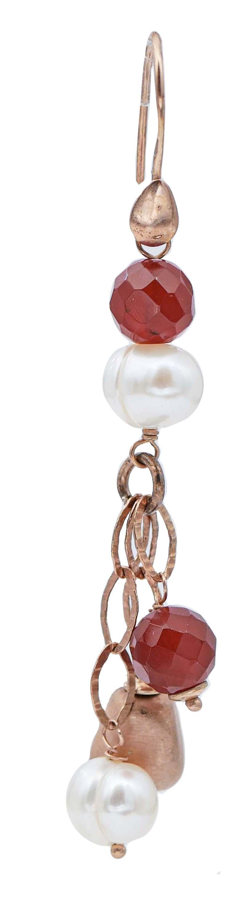 SHIPPING POLICY: 
 Shipping costs will be totally covered by the seller

Simple retrò earrings in silver structure mounted with carnelian and pearls.
These earrings were totally handmade by Italian master goldsmiths and they are in perfect