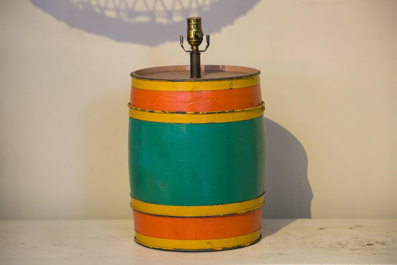 Carnival barrel table lamp, newly wired for use within the USA. This charming lamp comes from a hand-painted, hand-made carnival barrel. I find the colors so happy and colorful on this one-of-a-kind lamp. I suppose its style is coastal or country,
