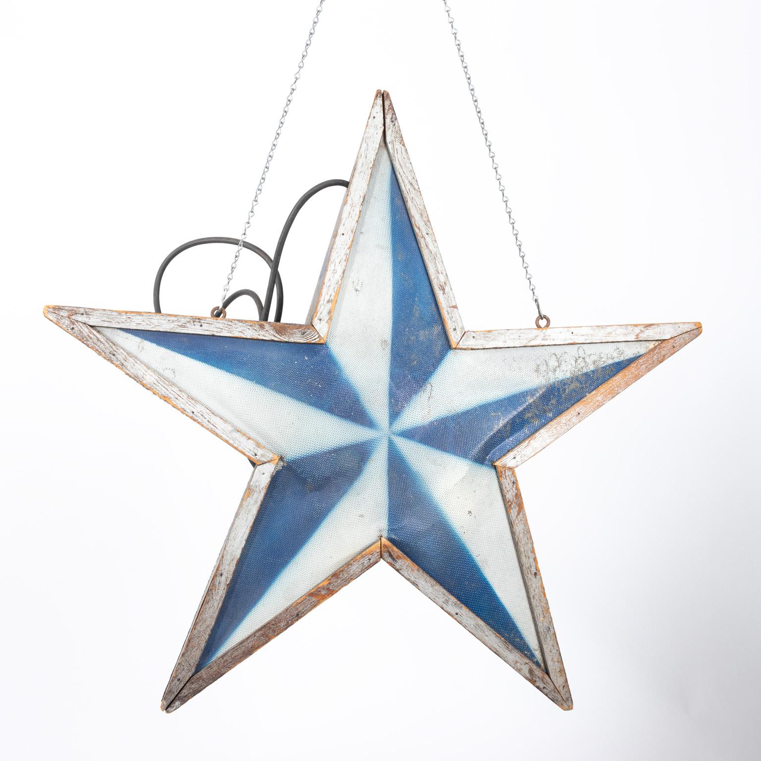 Folk Art carnival star light plate in red, white, and blue with original wiring, circa 1950s. Made in the United States. Please note of wear consistent with age including minor paint and color loss.