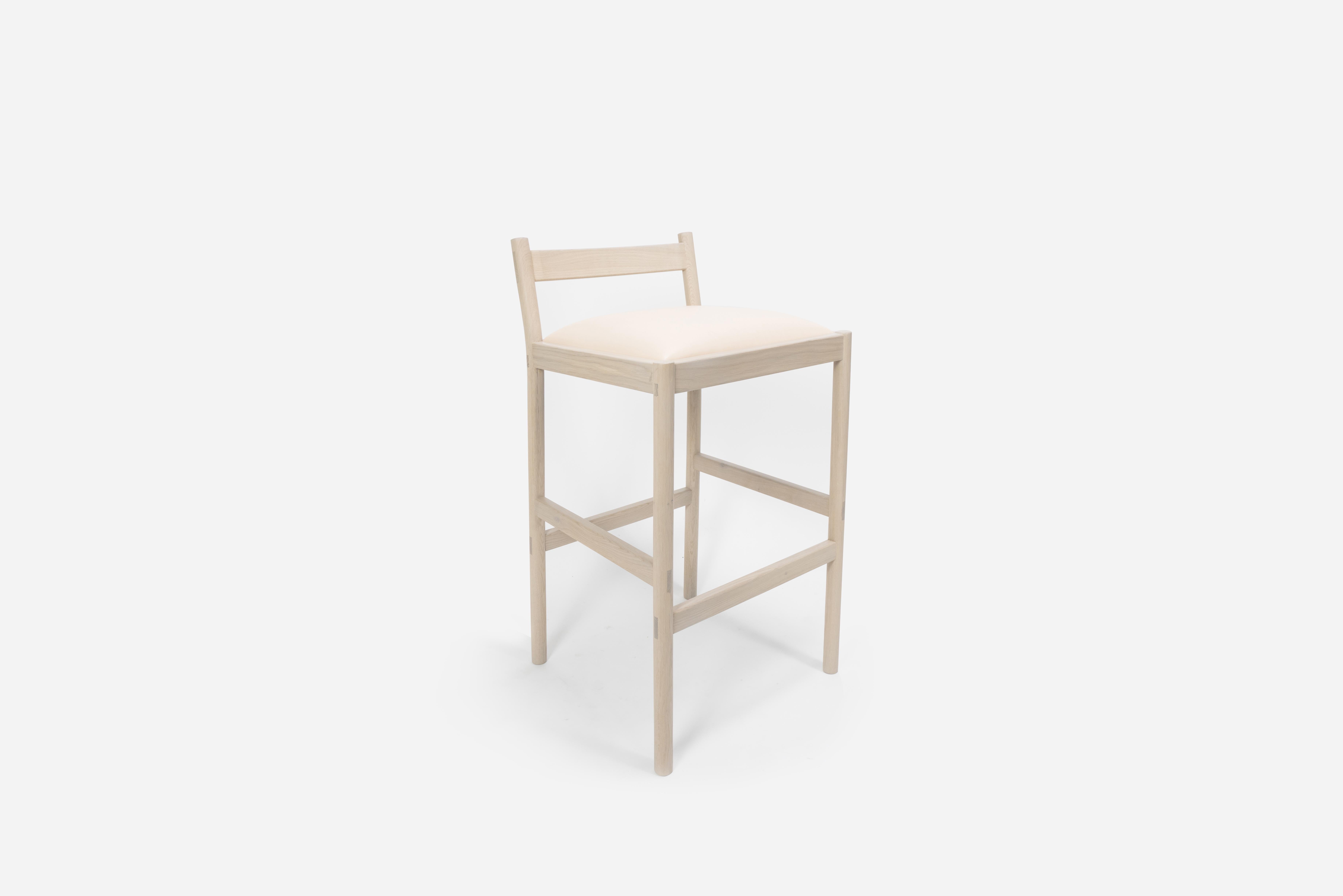 Sun at Six is a contemporary furniture design studio that works with traditional Chinese joinery masters to handcraft our pieces using traditional joinery. This minimal bar stool combines clean lines with quality material: solid white oak and