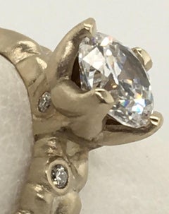 CAROL ACKERMAN  14k YG Carved Leaf Ring, Cubic Zirconia Setting with 8 Diamonds