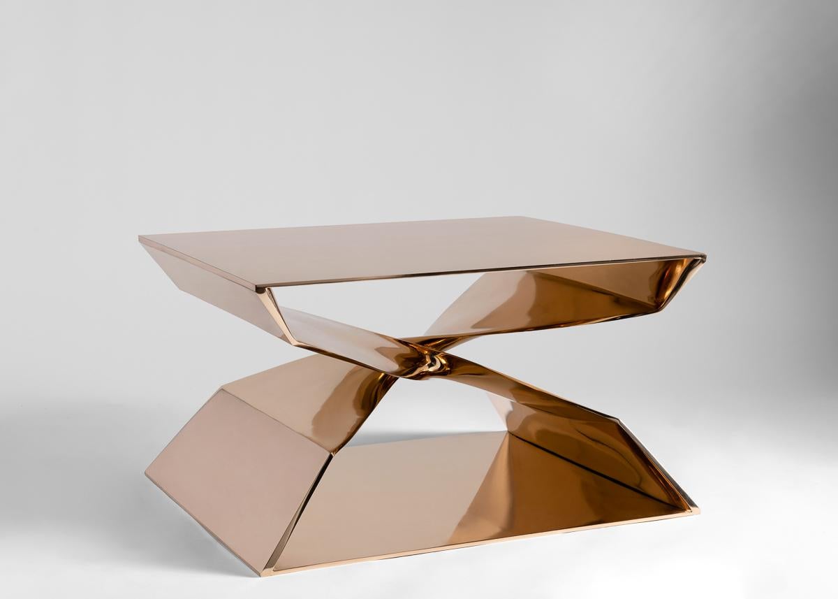 This sculptural stool is part of a line of contemporary furniture
designed by blending digital technology with fine traditional
craftsmanship. Cast in bronze, the stool features two crisscrossing
buttresses that twist 180 degrees to engage in